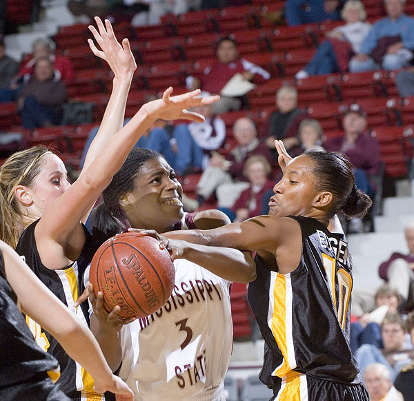 Women's basketball action vs USM