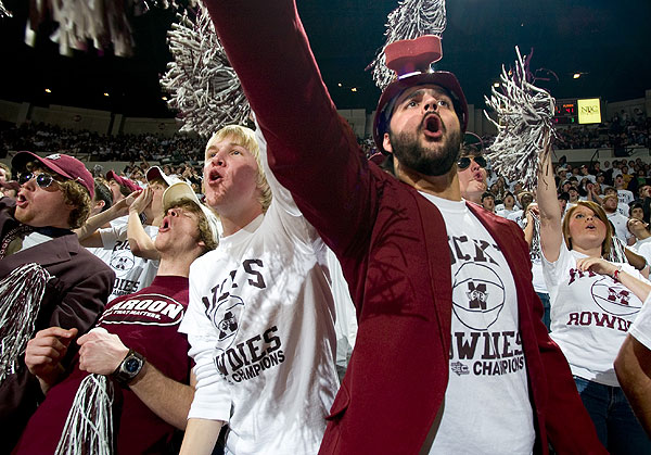 Basketball fans yelling at basketball game