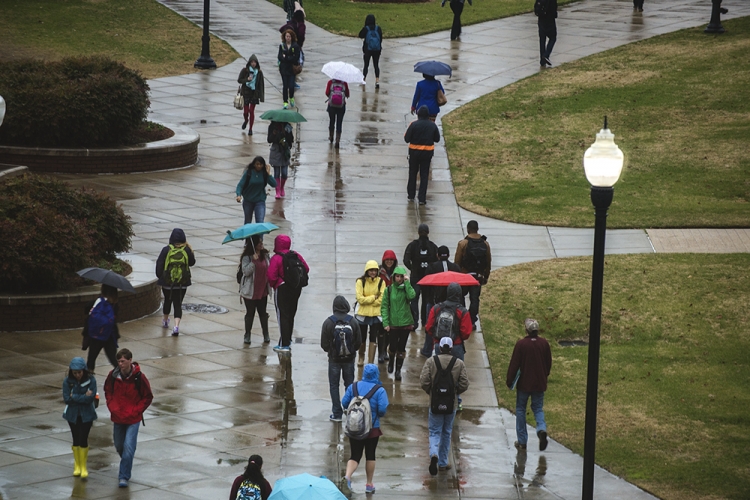 Students Walking On Drill Field