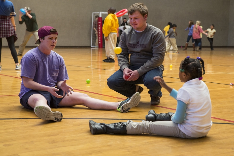 Pi Kappa Phi Fraternity brothers volunteer - Sanderson