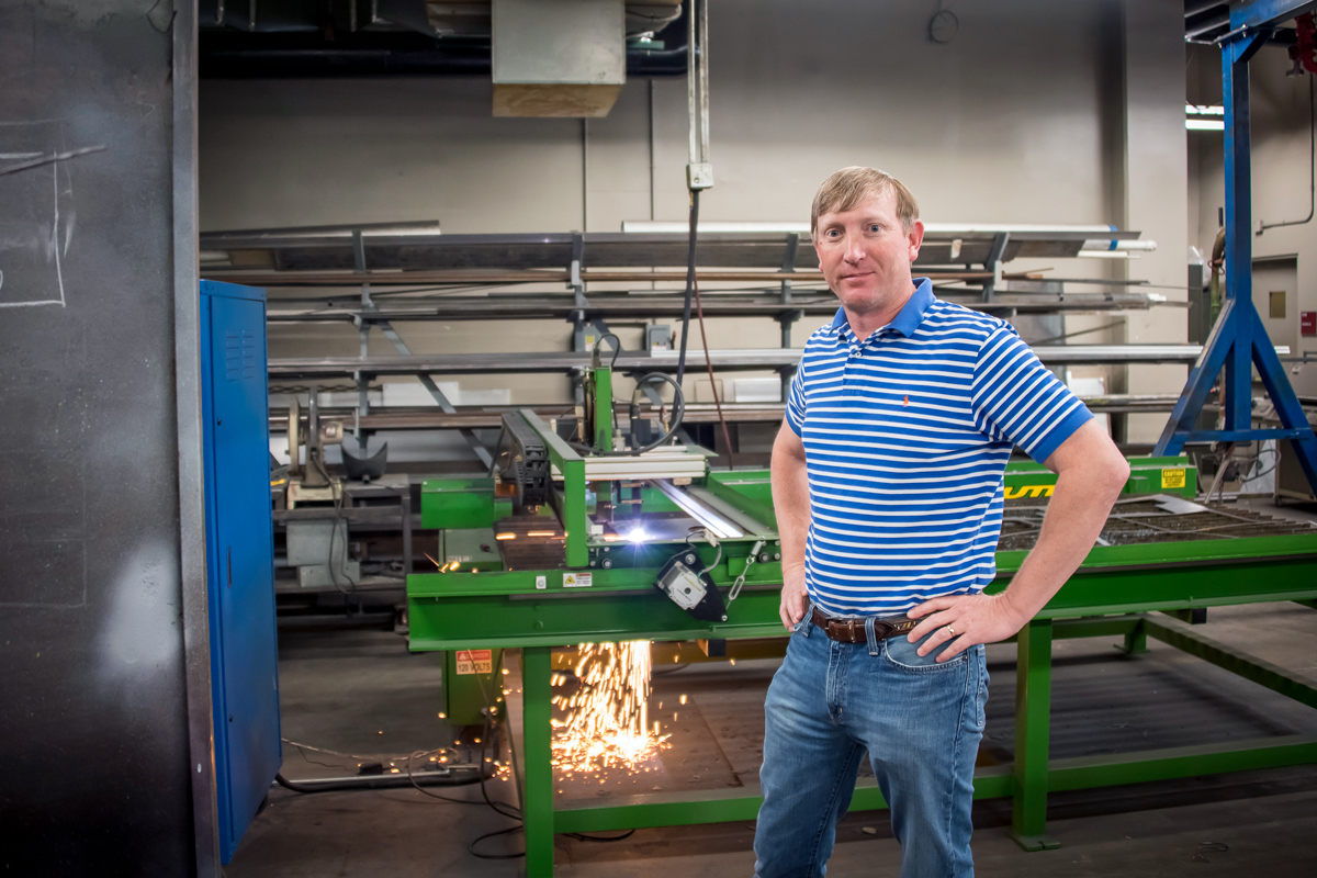 Wes Lowe stands in the Mississippi Agricultural and Forestry Experiment Station&amp;amp;#039;s machine shop.