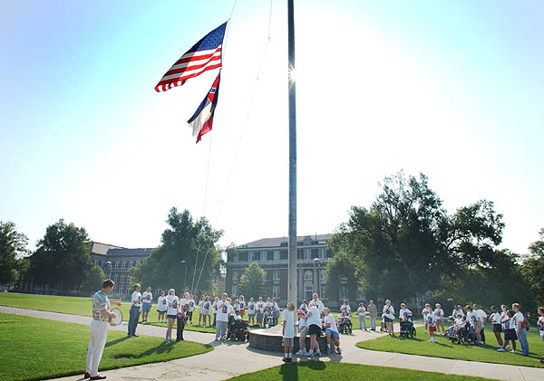 Camp Jabberjaw kids raising flag