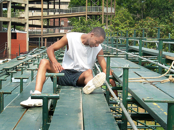 Setting up endzone bleachers at football field