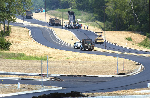 Finalizing paving on north entrance road