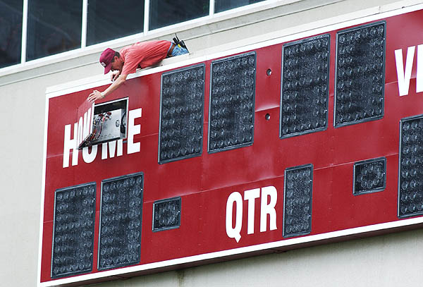 Installing new football scoreboard