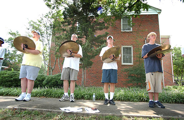Cymbal section of band practicing