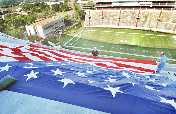 Campus Landscape lays out flag in upper deck
