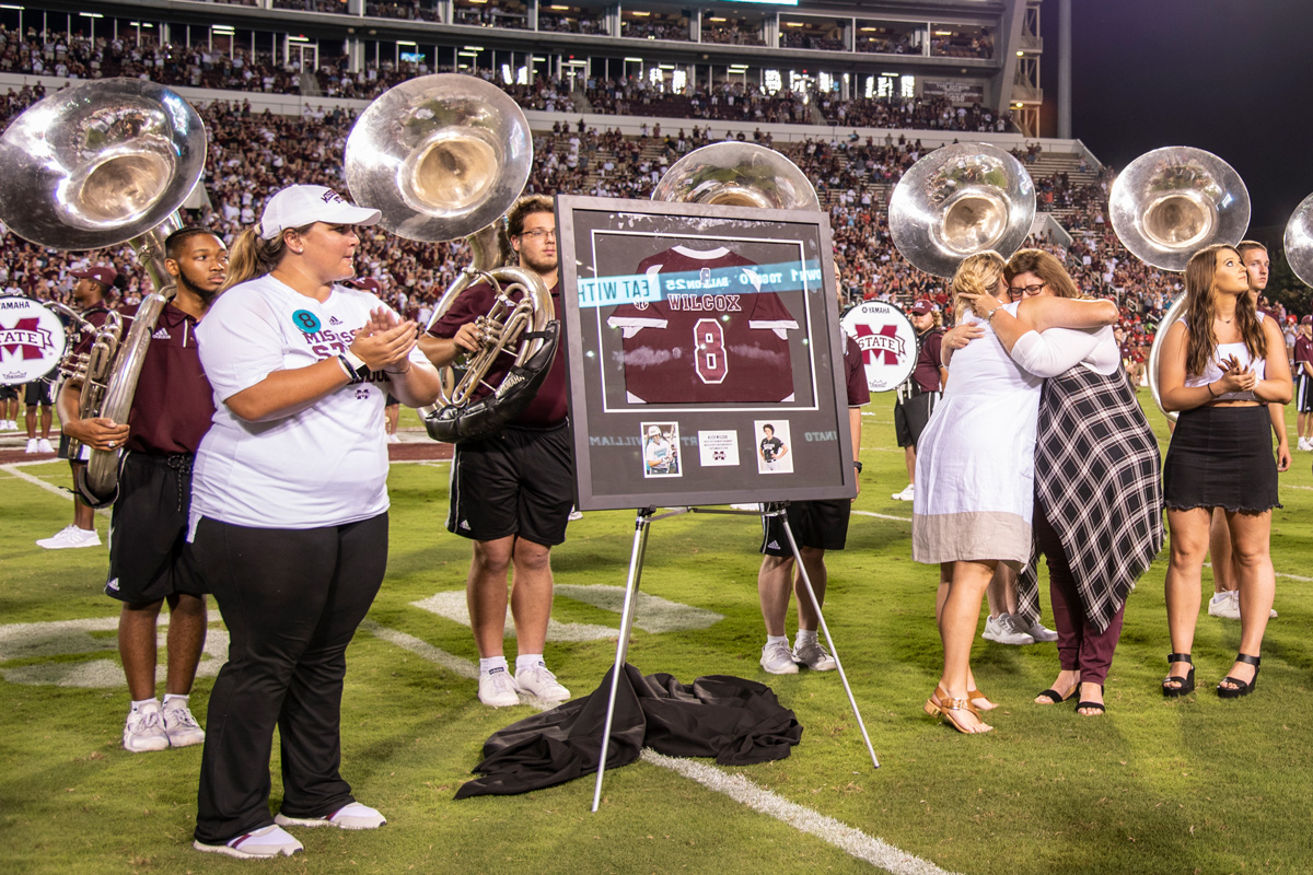 The late Alex Wilcox&amp;amp;#039;s jersey is retired during her memorial ceremony.   