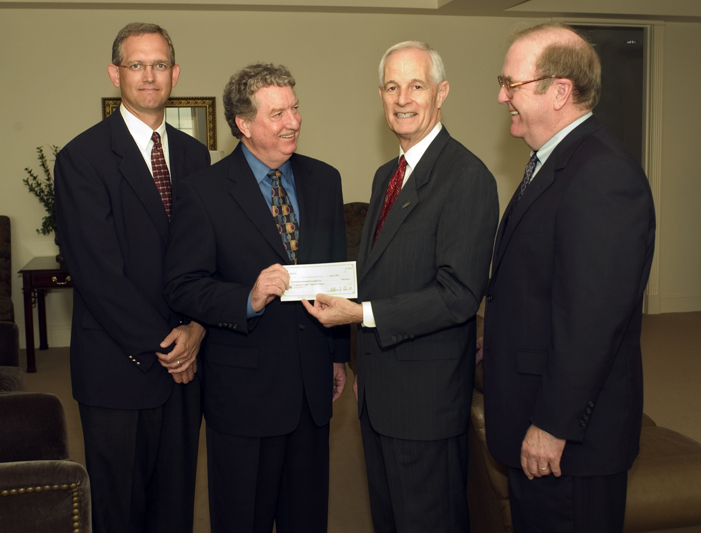 <br /><br />
3M representatives (l-r) Brian Schoebel and Larry Thomason present a check to Bagley College of Engineering dean A. Wayne Bennett and industrial engineering department head Larry Brown as the first installment of more than $500,000 the St. Paul, Minn.-based company will provide over two years to establish a Six Sigma Certificate program at MSU. The program is designed to provide engineering students with the latest methods of ensuriing customer satisfaction through quality control.<br /><br />
<br /><br />
3M representatives (l-r) Brian Schoebel and Larry Thomason present a check to Bagley College of Engineering dean A. Wayne Bennett and industrial engineering department head Larry Brown as the first installment of more than $500,000 the St. Paul, Minn.-based company will provide over two years to establish a Six Sigma Certificate program at MSU. The program is designed to provide engineering students with the latest methods of ensuriing customer satisfaction through quality control.<br /><br />