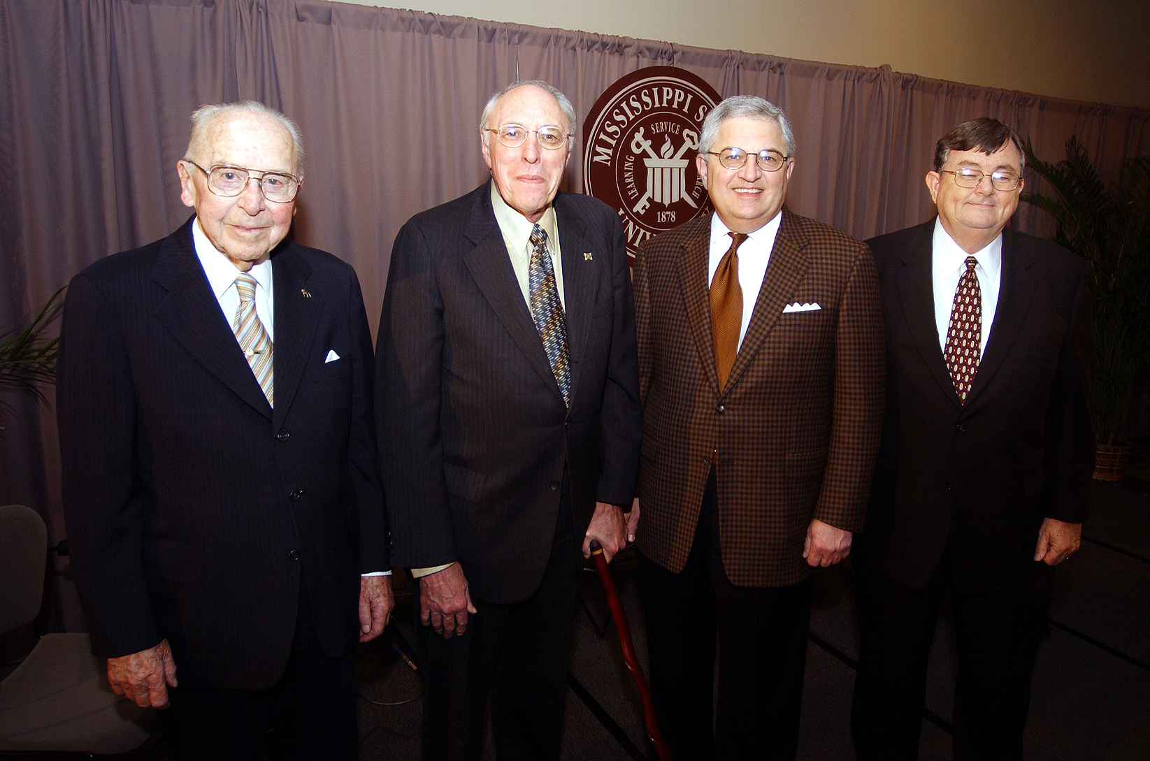 <br /><br />
Celebrating Mississippi State University's 125th anniversary, all four living former and current presidents were on campus Feb. 28, 2003, for Founders Day activities. Participating in a program at the Hunter Henry Center are from left, Dean W. Colvard, Donald W. Zacharias, Malcolm Portera, and current MSU President J. Charles Lee. <br /><br />
Celebrating Mississippi State University's 125th anniversary, all four living former and current presidents were on campus Feb. 28, 2003, for Founders Day activities. Participating in a program at the Hunter Henry Center are from left, Dean W. Colvard, Donald W. Zacharias, Malcolm Portera, and current MSU President J. Charles Lee.