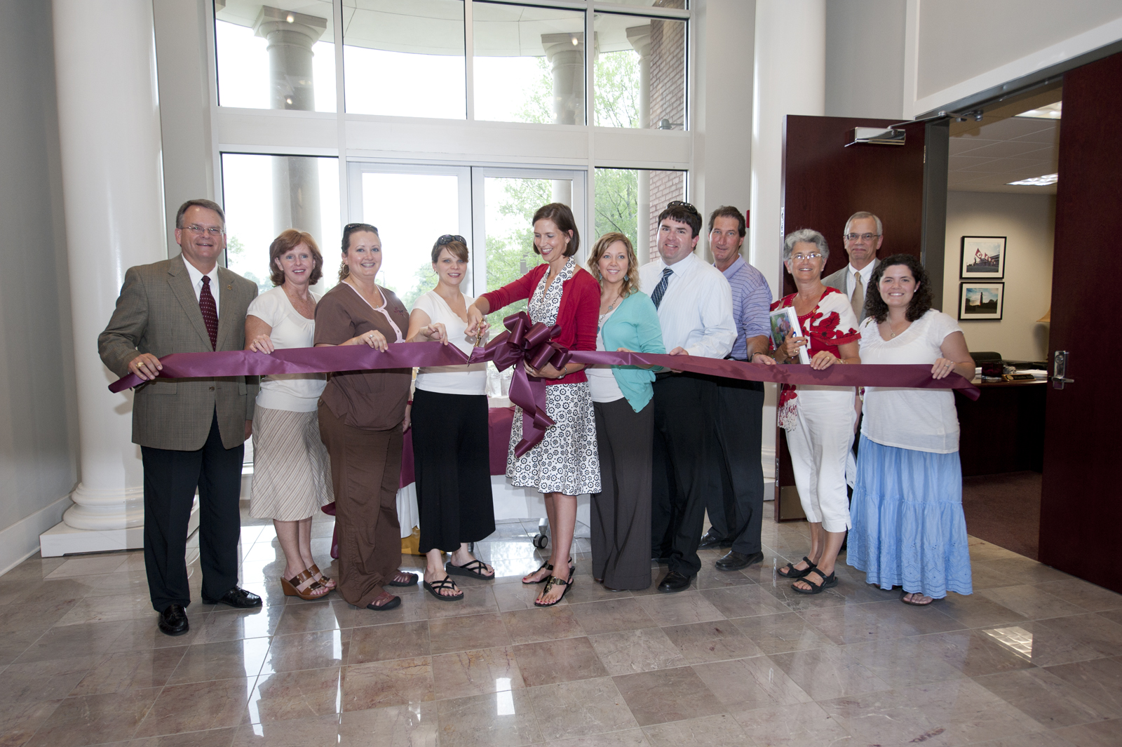 Those participating in the ribbon cutting ceremony for the new lactation support program at Mississippi State were Bill Kibler, vice president for student affairs; Nancy Fultz, academic support programs manager; JuLeigh Baker, health and wellness educator; Angi Bourgeois, art associate professor; Lady Cox, parent services director; Suzanne Mattison, lecturer in English; Roger Baker, campus master planner; Bobby Tomlinson, associate director of athletic game operations; Linda McGrath, lactation consultant; Heather Craig, graduate student; and Jerry Gilbert, provost and executive vice president. Those participating in the ribbon cutting ceremony for the new lactation support program at Mississippi State were Bill Kibler, vice president for student affairs; Nancy Fultz, academic support programs manager; JuLeigh Baker, health and wellness educator; Angi Bourgeois, art associate professor; Lady Cox, parent services director; Suzanne Mattison, lecturer in English; Roger Baker, campus master planner; Bobby Tomlinson, associate director of athletic game operations; Linda McGrath, lactation consultant; Heather Craig, graduate student; and Jerry Gilbert, provost and executive vice president.