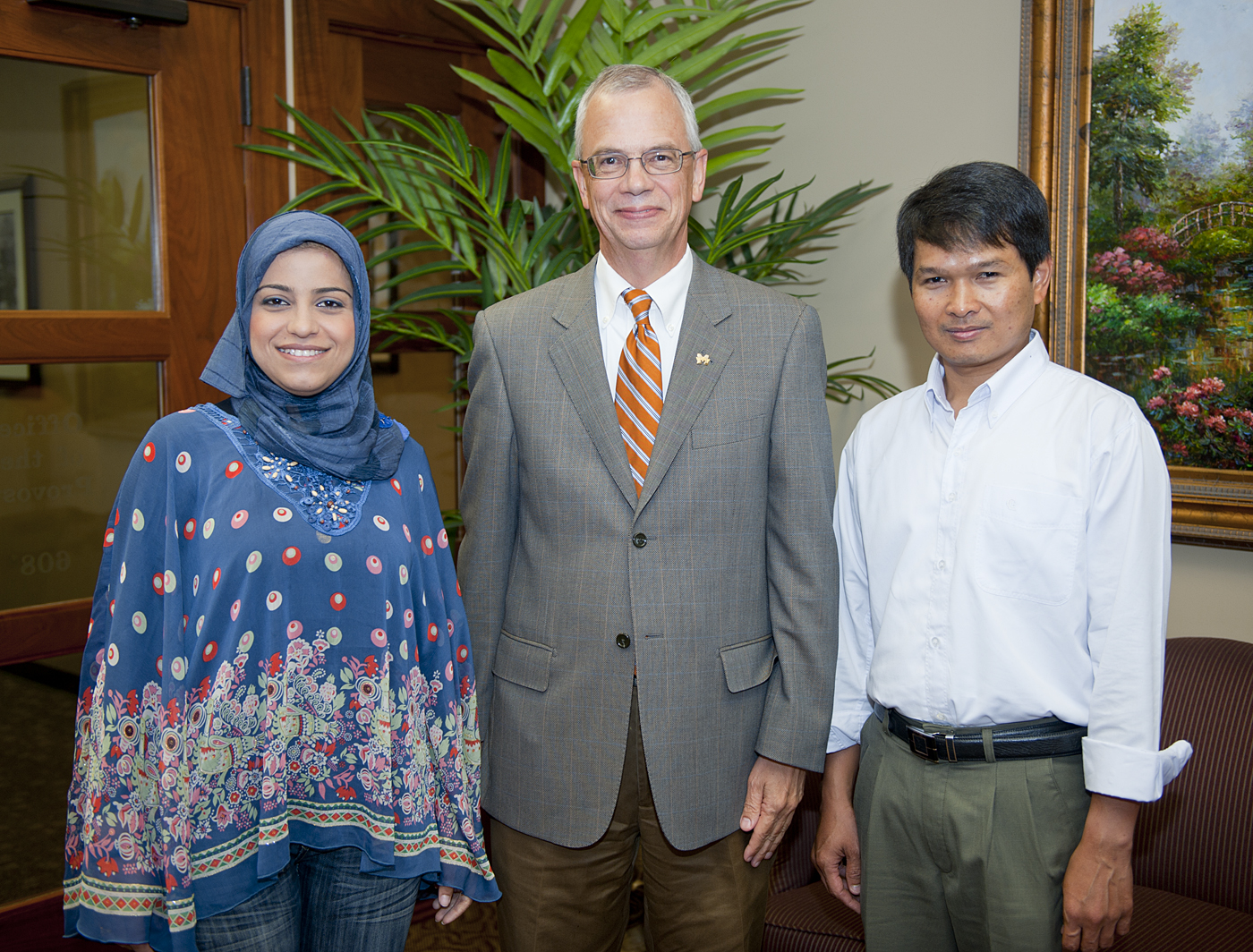 Gharrawi(l) and Roth (r) with Jerry Gilbert, MSU provost and executive vice president Gharrawi(l) and Roth (r) with Jerry Gilbert, MSU provost and executive vice president
