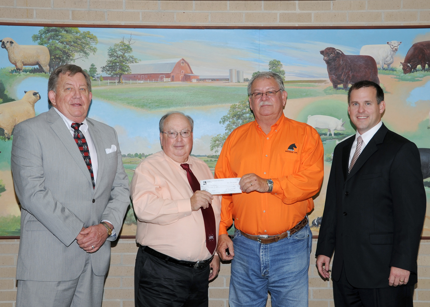 James Watts (from left), MSEA executive director; Terry Kiser, retiring head of MSU's animal and dairy sciences department; James Rasberry, MSEA president; and Jud Skelton, College of Agriculture and Life Sciences development director. James Watts (from left), MSEA executive director; Terry Kiser, retiring head of MSU's animal and dairy sciences department; James Rasberry, MSEA president; and Jud Skelton, College of Agriculture and Life Sciences development director.