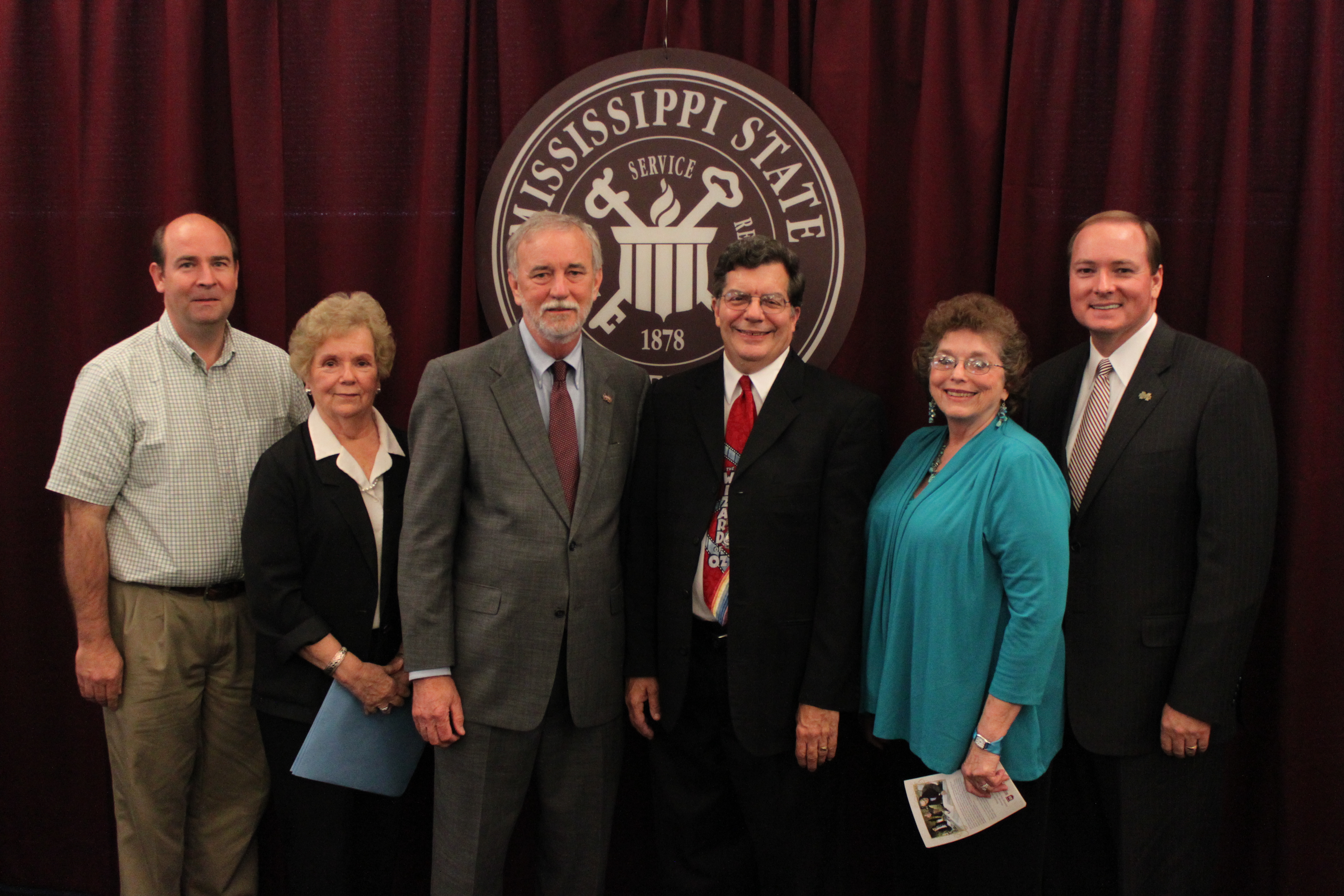 Participating in the recent donation to MSU of papers from two historic Meridian structures were (l-r) Gregory Hatcher, vice president, Grand Opera House of Mississippi Inc.; Frances Coleman, dean, MSU Libraries; Dennis Mitchell, professor, MSU-Meridian; Harold "Nick" Nichols, retired dean, MSU-Meridian; Margaret Remy, president, Grand Opera House; and Mark E. Keenum, president, MSU. Photo by Jim Tomlinson/MSU Libraries Participating in the recent donation to MSU of papers from two historic Meridian structures were (l-r) Gregory Hatcher, vice president, Grand Opera House of Mississippi Inc.; Frances Coleman, dean, MSU Libraries; Dennis Mitchell, professor, MSU-Meridian; Harold "Nick" Nichols, retired dean, MSU-Meridian; Margaret Remy, president, Grand Opera House; and Mark E. Keenum, president, MSU. Photo by Jim Tomlinson/MSU Libraries
