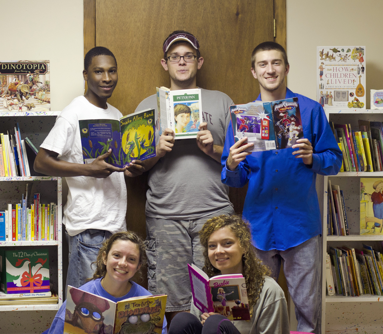 As part of the 44 teams in the Day One Leadership Community at Mississippi State University, the Happy Heroes led a book drive that collected more than 600 books, built two bookcases and mentored children at the Happy Start Learning Center on Highway 82. Participating students are, standing left to right, Michael Houston of Lyon; Tyler Howell of Orlando, Fla.; Joshua Mellott of Hoschton,Ga.; and sitting, Hannah Weisenberger and Ramsey Rankin, both of Clinton. As part of the 44 teams in the Day One Leadership Community at Mississippi State University, the Happy Heroes led a book drive that collected more than 600 books, built two bookcases and mentored children at the Happy Start Learning Center on Highway 82. Participating students are, standing left to right, Michael Houston of Lyon; Tyler Howell of Orlando, Fla.; Joshua Mellott of Hoschton,Ga.; and sitting, Hannah Weisenberger and Ramsey Rankin, both of Clinton.