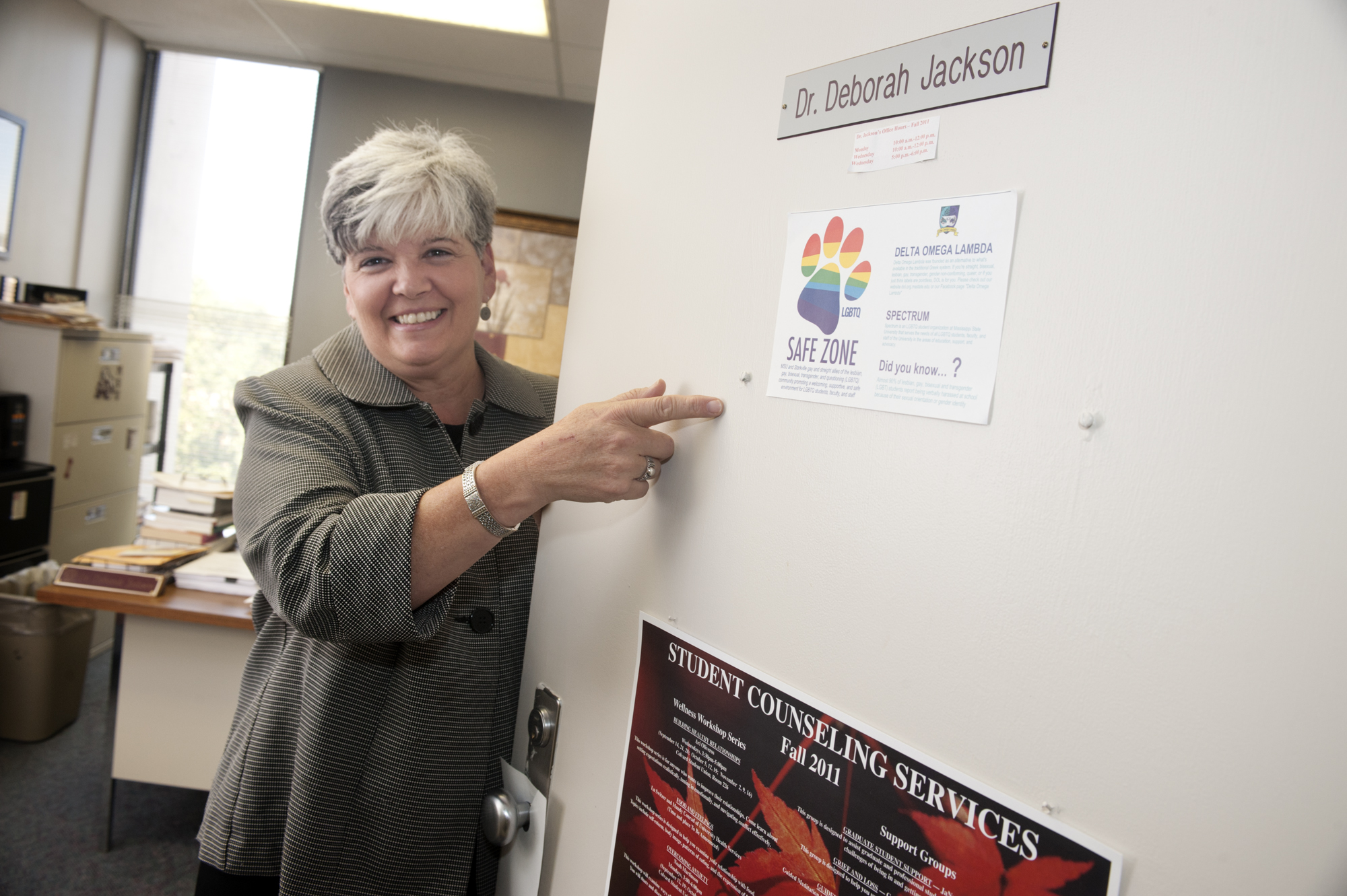 Deborah Jackson, an assistant professor in MSU's department of counseling and educational psychology, displays a Safe Zone office sticker. Deborah Jackson, an assistant professor in MSU's department of counseling and educational psychology, displays a Safe Zone office sticker.