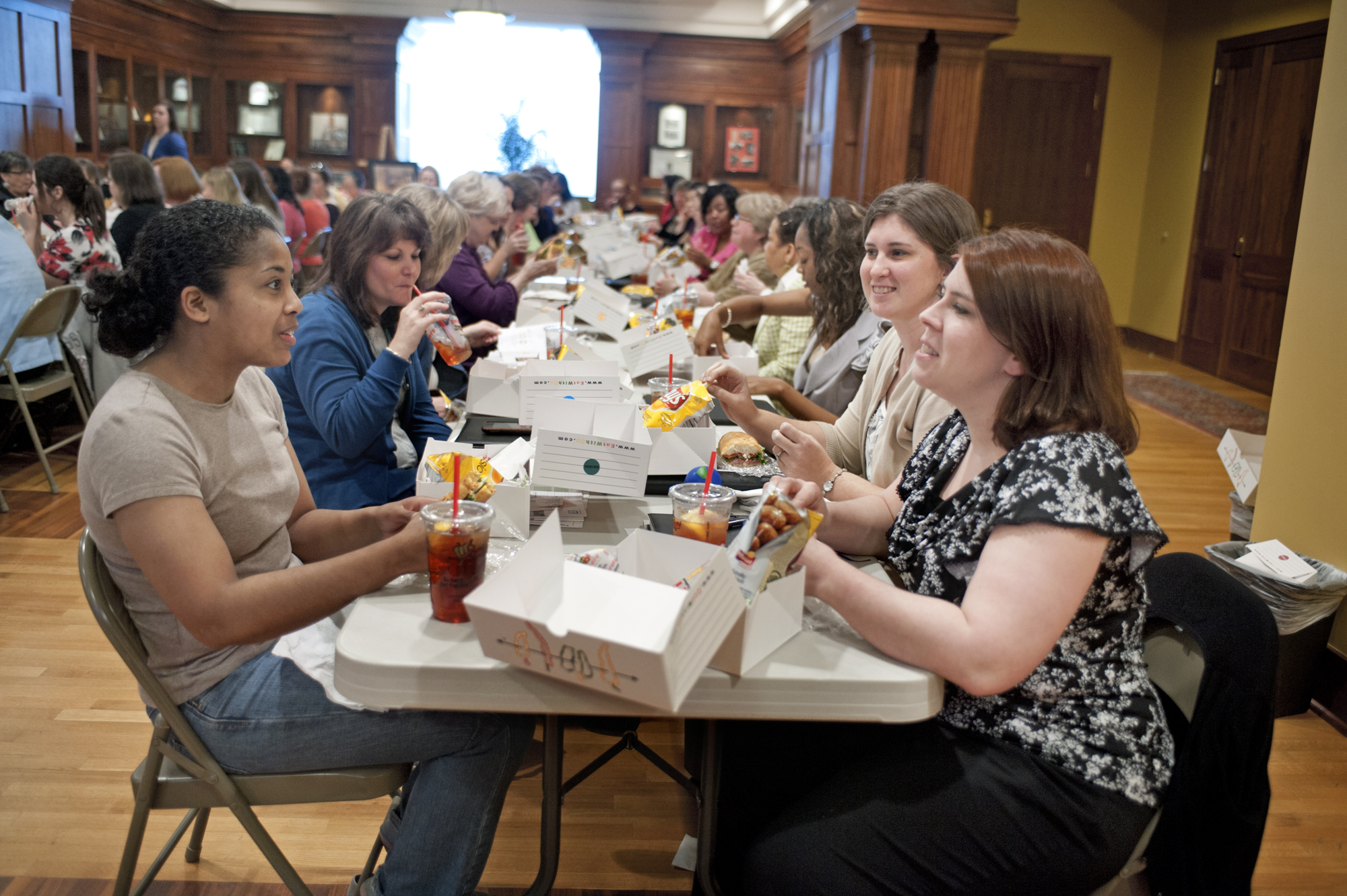 MSU graduate student Sheena Gardner, left, visits with sociology faculty member Kimberly Kelly, right, during the recent Food for Thought luncheon presented by the President's Commission on the Status of Women. The event, which focused on "Financial Planning for Women," drew a record crowd, and organizers said the luncheon was just one of many activities designed to engage more women on campus and discuss issues of importance to them.<br /><br />
MSU graduate student Sheena Gardner, left, visits with sociology faculty member Kimberly Kelly, right, during the recent Food for Thought luncheon presented by the President's Commission on the Status of Women. The event, which focused on "Financial Planning for Women," drew a record crowd, and organizers said the luncheon was just one of many activities designed to engage more women on campus and discuss issues of importance to them.<br /><br />
