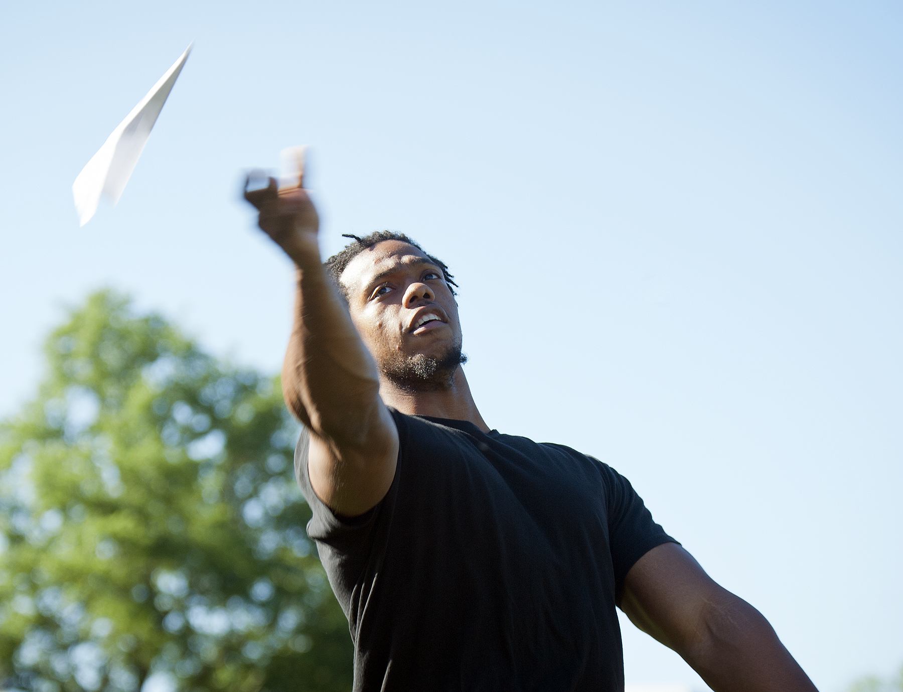 Junior kinesiology major Byron Robinson, of Mound Bayou, launches his paper airplane during the event. Junior kinesiology major Byron Robinson, of Mound Bayou, launches his paper airplane during the event.
