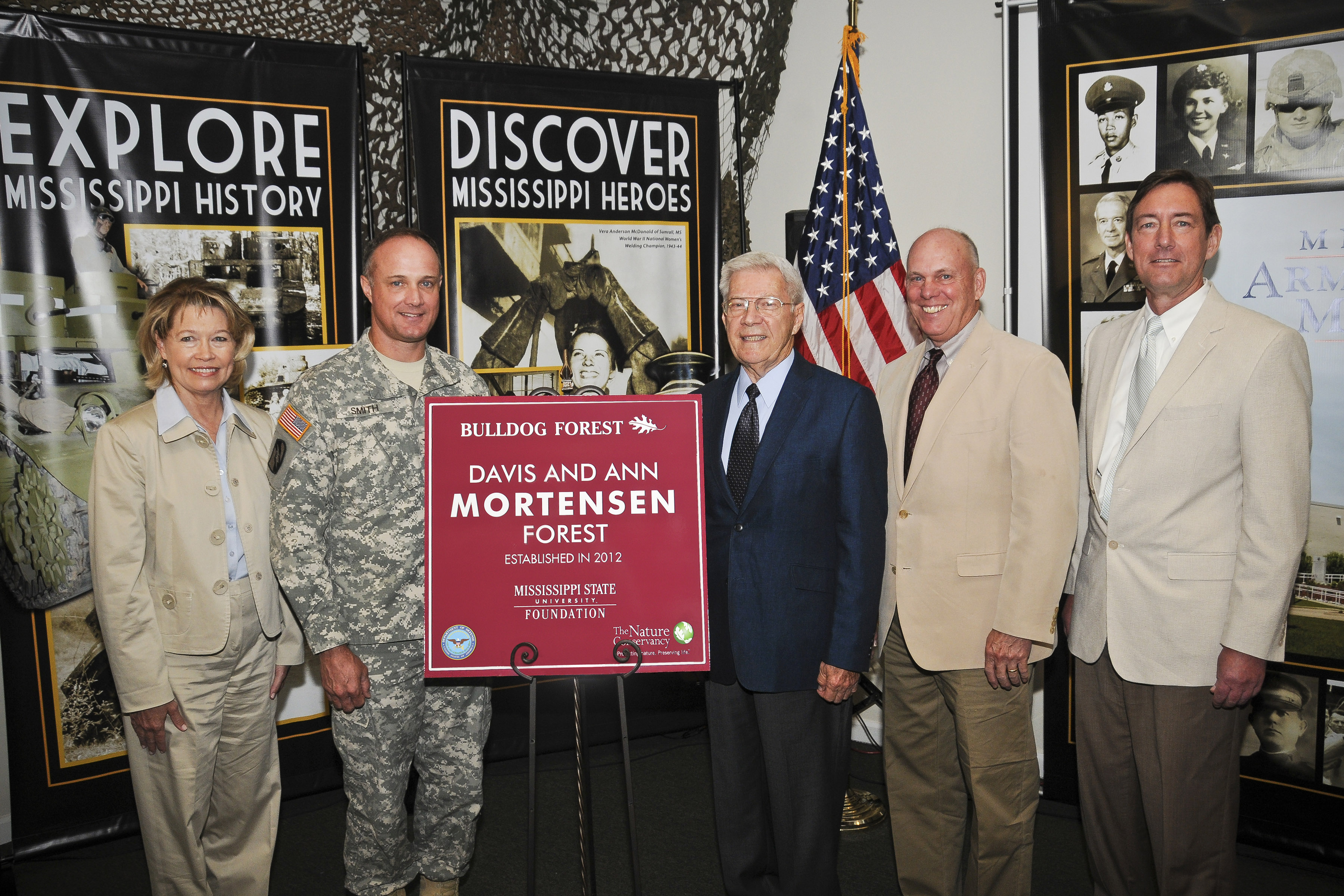 Pictured during the May 29 dedication ceremony, from left, Susan Hollandsworth of The Nature Conservancy; Col. William B. Smith Jr., Camp Shelby installation commander; Davis Mortensen; George Hopper, dean of MSU's College of Forest Resources; and Gregory Bohach, vice president of MSU's Division of Agriculture, Forestry and Veterinary Medicine. Pictured during the May 29 dedication ceremony, from left, Susan Hollandsworth of The Nature Conservancy; Col. William B. Smith Jr., Camp Shelby installation commander; Davis Mortensen; George Hopper, dean of MSU's College of Forest Resources; and Gregory Bohach, vice president of MSU's Division of Agriculture, Forestry and Veterinary Medicine.