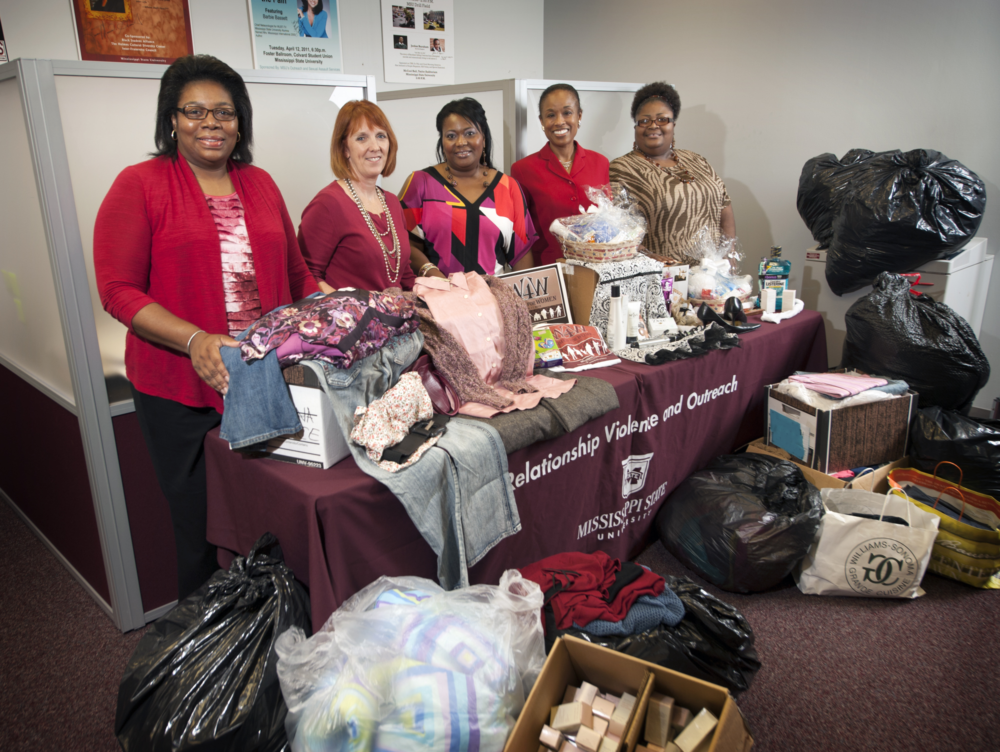 Together, the Mississippi State University Department of Relationship Violence and Outreach and the President's Commission on the Status of Women sponsored a community outreach project to gather clothes and toiletries for Safe Haven, a local shelter for abused women. From left are Tamara Gibson, PCSW secretary; Debbie Dunaway, PCSW chairwoman; Dorothy Givens-Cummings, Safe Haven's coordinator for sexual assault services; Beatrice Tatem, director of the department and PCSW vice chairwoman; and Aretina Hankerson-Daniels, administrative assistant for the department. Together, the Mississippi State University Department of Relationship Violence and Outreach and the President's Commission on the Status of Women sponsored a community outreach project to gather clothes and toiletries for Safe Haven, a local shelter for abused women. From left are Tamara Gibson, PCSW secretary; Debbie Dunaway, PCSW chairwoman; Dorothy Givens-Cummings, Safe Haven's coordinator for sexual assault services; Beatrice Tatem, director of the department and PCSW vice chairwoman; and Aretina Hankerson-Daniels, administrative assistant for the department.