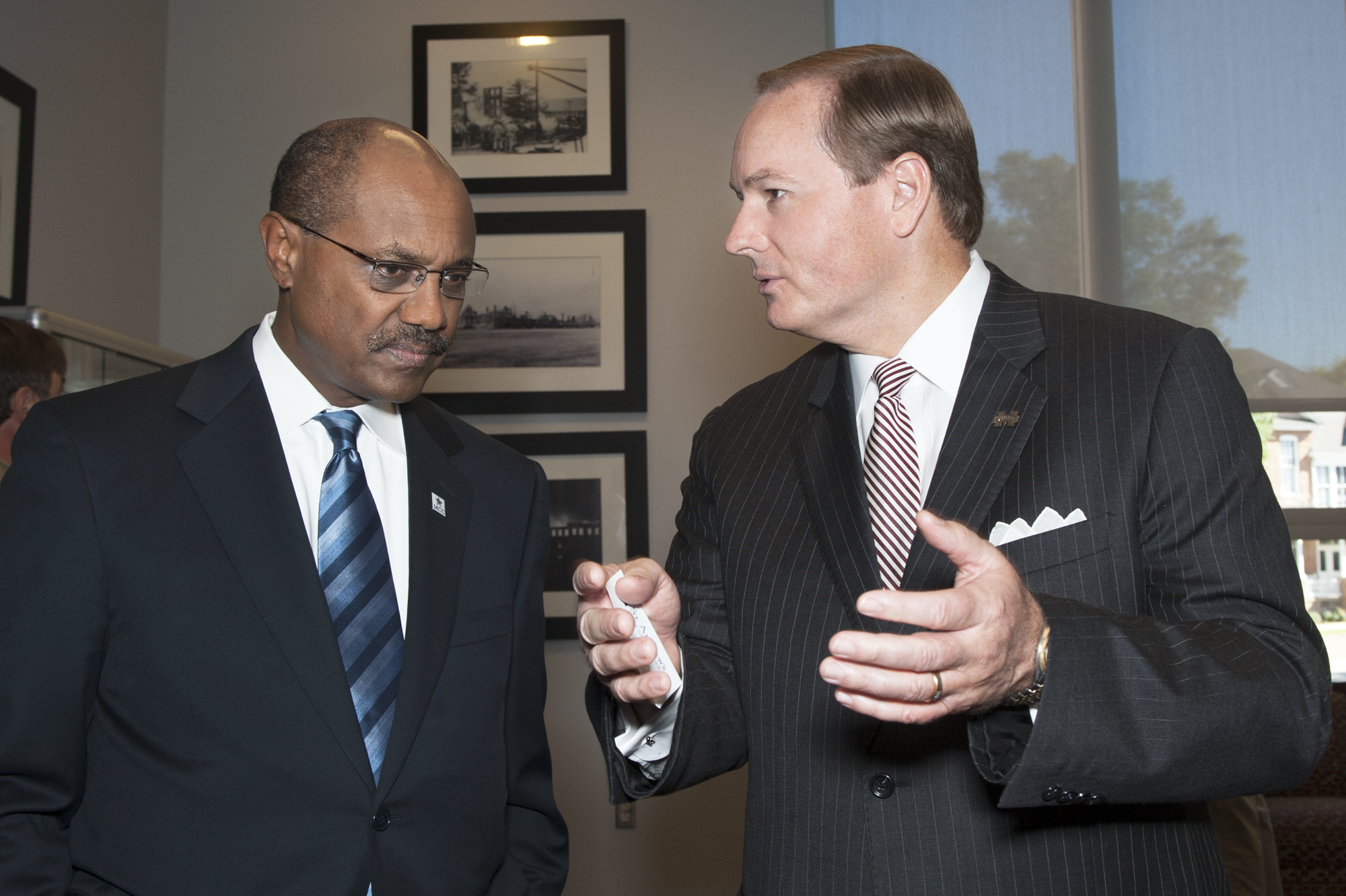 Daniel Yohannes, left, CEO of the Millennium Challenge Corp., listens as MSU President Mark E. Keenum, discusses the university's role in food safety research. Daniel Yohannes, left, CEO of the Millennium Challenge Corp., listens as MSU President Mark E. Keenum, discusses the university's role in food safety research.