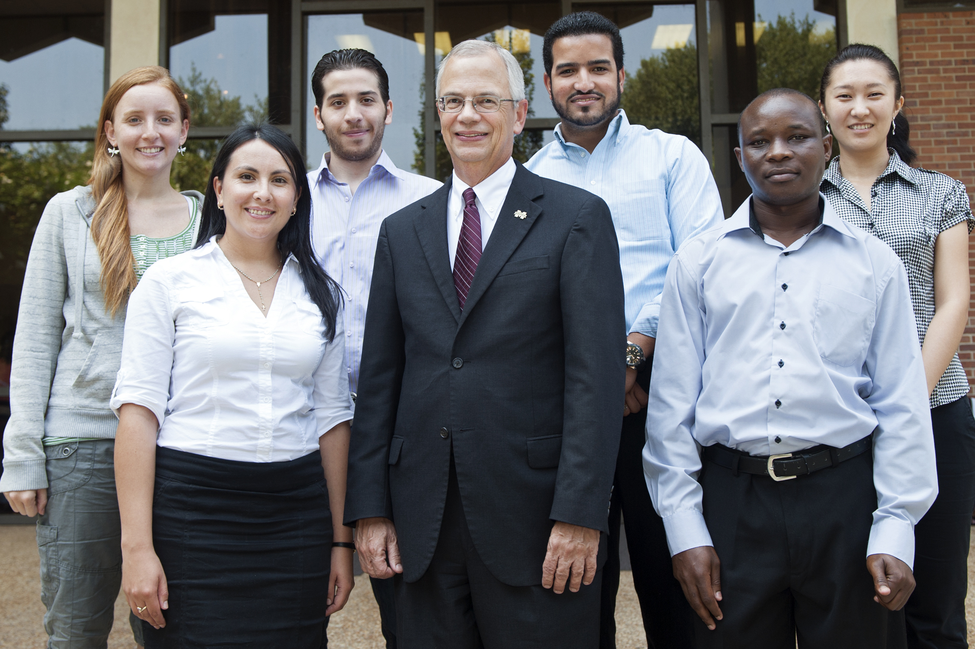 New Fulbright Scholars shown with MSU Provost and Executive Vice President Jerry Gilbert, center, are front row, (l-r), Gina Rico Mendez and Job Bonyo; and back row, (r-l) Rosanna Carreras de Leon, Mohammad Al Boni, Carlos Cabrera and Anara Kozhokanova. New Fulbright Scholars shown with MSU Provost and Executive Vice President Jerry Gilbert, center, are front row, (l-r), Gina Rico Mendez and Job Bonyo; and back row, (r-l) Rosanna Carreras de Leon, Mohammad Al Boni, Carlos Cabrera and Anara Kozhokanova.