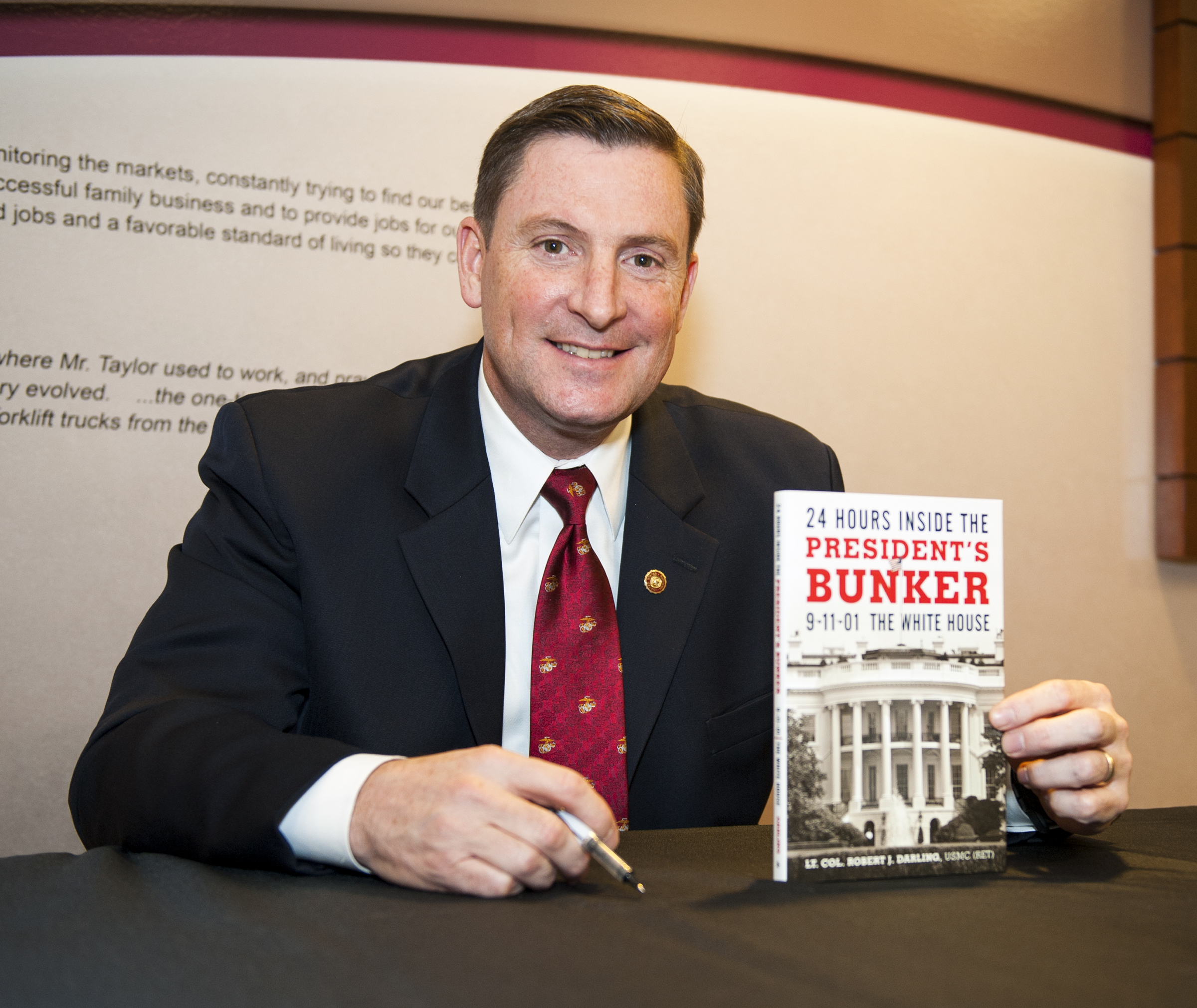 Retired Lt. Col. Robert J. Darling signed copies of his book, "24 Hours Inside the President's Bunker: 9-11-01," both before and after his Thursday night presentation at MSU, where he remembered the events surrounding Sept. 11, 2001, and thanked all service members, past and present, for their sacrifice. Retired Lt. Col. Robert J. Darling signed copies of his book, "24 Hours Inside the President's Bunker: 9-11-01," both before and after his Thursday night presentation at MSU, where he remembered the events surrounding Sept. 11, 2001, and thanked all service members, past and present, for their sacrifice.