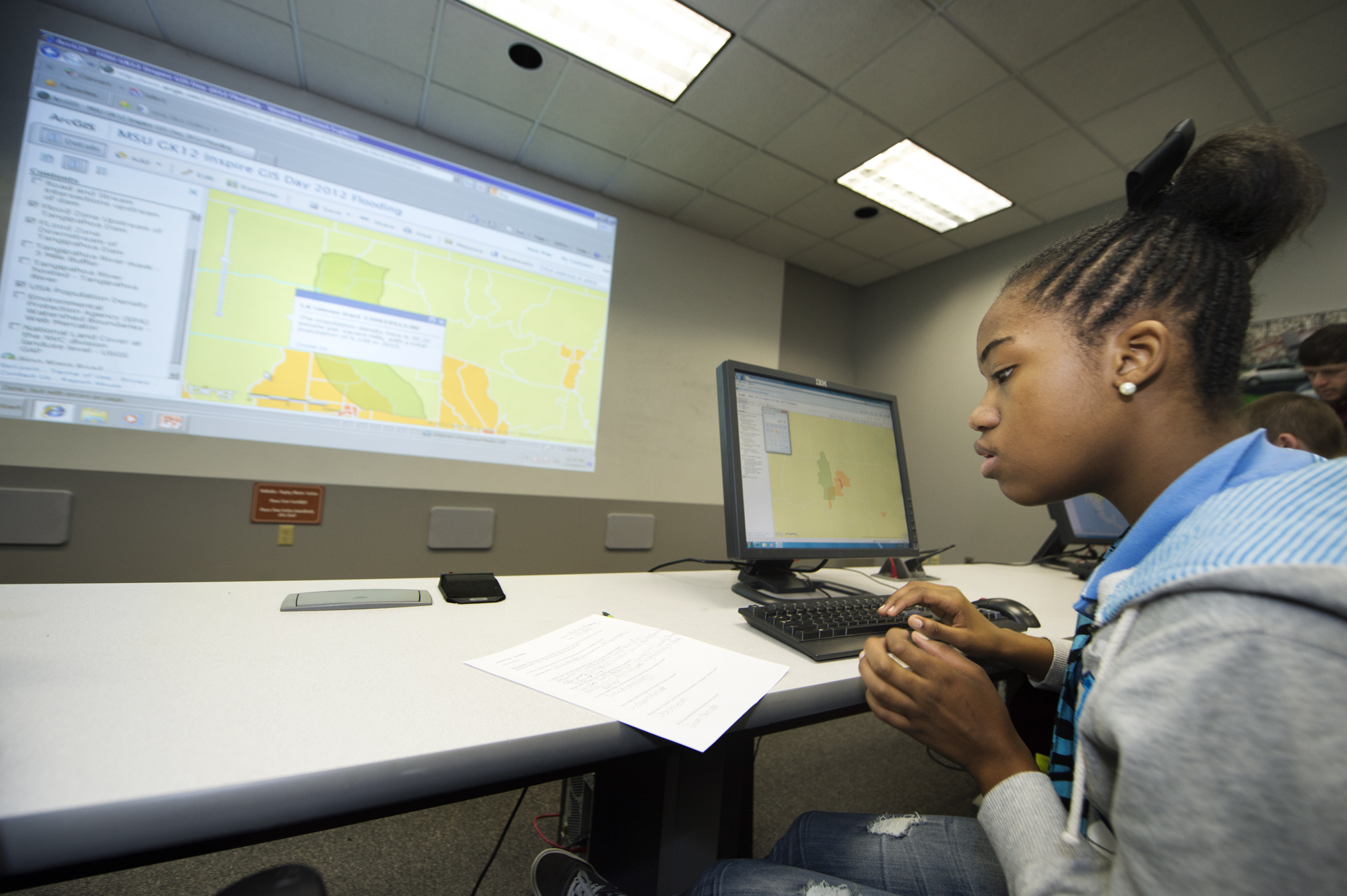 Columbus Middle School eighth-grader Mallory Manning uses geographic information systems to track a hurricane's trajectory in a computer lab at Mississippi State University, part of the institution's celebration of GIS Day. Columbus Middle School eighth-grader Mallory Manning uses geographic information systems to track a hurricane's trajectory in a computer lab at Mississippi State University, part of the institution's celebration of GIS Day.
