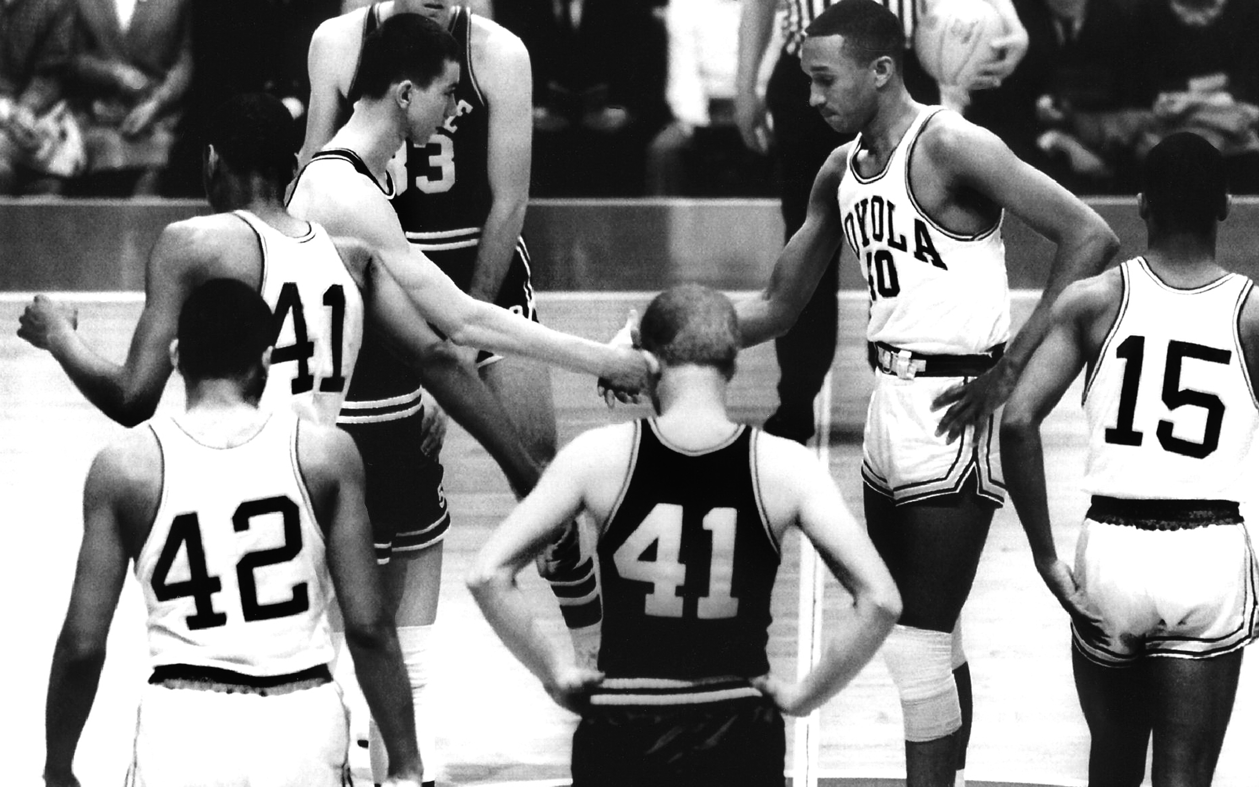 Mississippi State's All-SEC team captain Joe Dan Gold, left, and Loyola All-American Jerry Harkness, right, met at center court in Michigan State's Jenison Field House for the tipoff for the historic 1963 NCAA Basketball Tournament game. Gold extended his hand and Harkness shook it - making national headlines as MSU's administration and coaches defied the state's political power structure aligned against integration to compete for a national championship.</p><br />
<p> Mississippi State's All-SEC team captain Joe Dan Gold, left, and Loyola All-American Jerry Harkness, right, met at center court in Michigan State's Jenison Field House for the tipoff for the historic 1963 NCAA Basketball Tournament game. Gold extended his hand and Harkness shook it - making national headlines as MSU's administration and coaches defied the state's political power structure aligned against integration to compete for a national championship.</p><br />
<p>