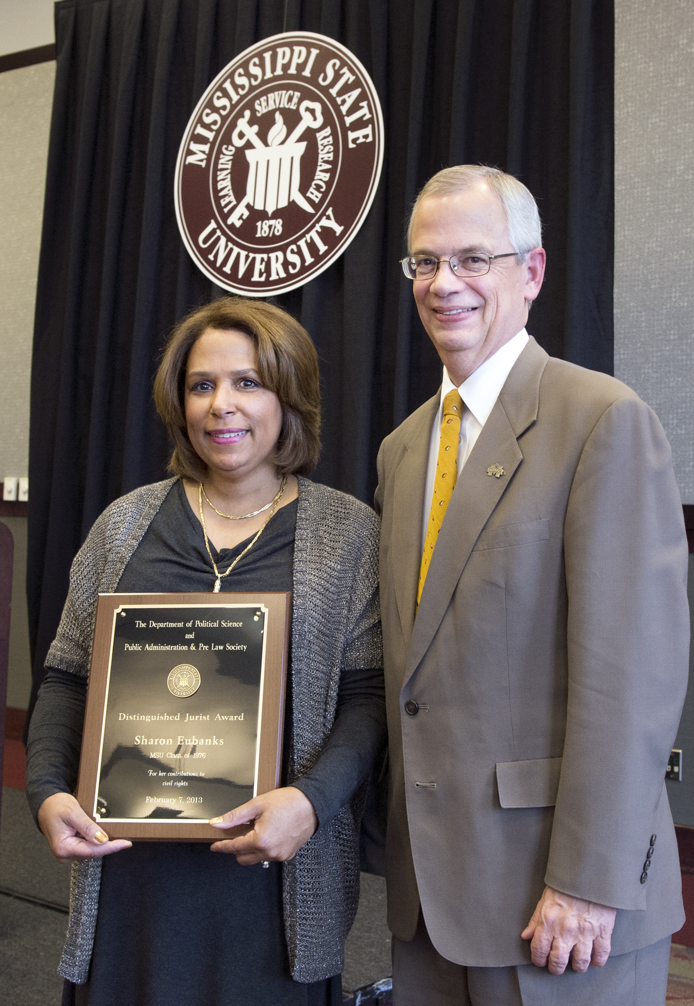 Alumnus and attorney Sharon Eubanks receives the MSU Distinguished Jurist Award from Jerry Gilbert, provost and executive vice president. The annual award is given by the university's political science and public administration department and by the MSU Pre-Law Society. Alumnus and attorney Sharon Eubanks receives the MSU Distinguished Jurist Award from Jerry Gilbert, provost and executive vice president. The annual award is given by the university's political science and public administration department and by the MSU Pre-Law Society.