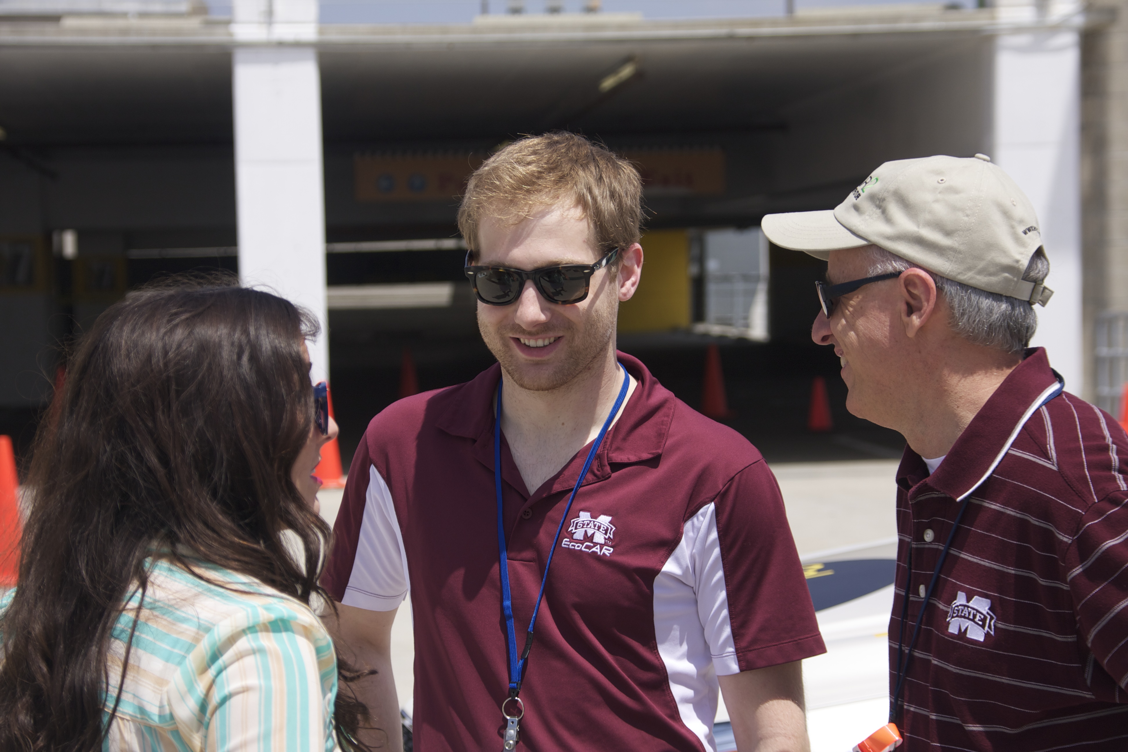 MSU Vice President for Research and Economic Development David Shaw, right, visits with Claire Faccini, communications manager for MSU's EcoCAR 2 team, and Josh Hoop, mechanical group leader, during the EcoCAR 2 competition in San Diego this week. MSU Vice President for Research and Economic Development David Shaw, right, visits with Claire Faccini, communications manager for MSU's EcoCAR 2 team, and Josh Hoop, mechanical group leader, during the EcoCAR 2 competition in San Diego this week.
