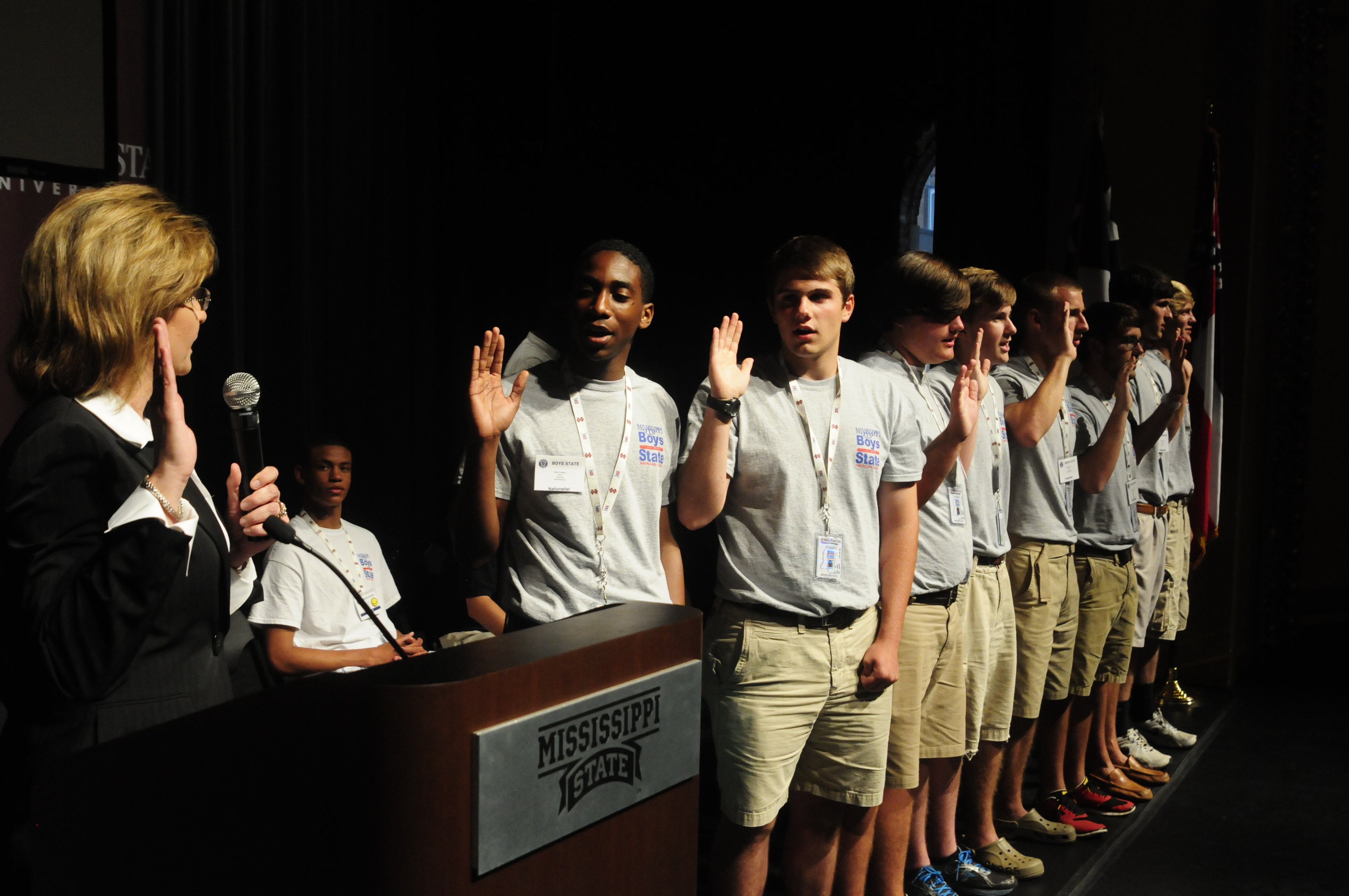 MSU Vice President for Campus Operations Amy Tuck, left, the former lieutenant governor of Mississippi, administered the oath of officers to the elected officials of the state of Magnolia on Wednesday night in Lee Hall at MSU. The officials... will serve as the "Big 8" statewide elected officials of Mississippi American Legion Boys State. Shown taking the oath were: Gov. Malik Pridgeon; Lt. Gov. Chauncey Mullins; Sec. of State Hayden Boutwell; Attorney General Brad Hudson; State Auditor Seth Dickinson; State Treasurer Garrett Scott; Insurance Commissioner James Valentine; and Agriculture Commissioner Joshua Holtcamp. Tuck led the MSU Boys State Host Planning Committee. MSU Vice President for Campus Operations Amy Tuck, left, the former lieutenant governor of Mississippi, administered the oath of officers to the elected officials of the state of Magnolia on Wednesday night in Lee Hall at MSU. The officials... will serve as the "Big 8" statewide elected officials of Mississippi American Legion Boys State. Shown taking the oath were: Gov. Malik Pridgeon; Lt. Gov. Chauncey Mullins; Sec. of State Hayden Boutwell; Attorney General Brad Hudson; State Auditor Seth Dickinson; State Treasurer Garrett Scott; Insurance Commissioner James Valentine; and Agriculture Commissioner Joshua Holtcamp. Tuck led the MSU Boys State Host Planning Committee.