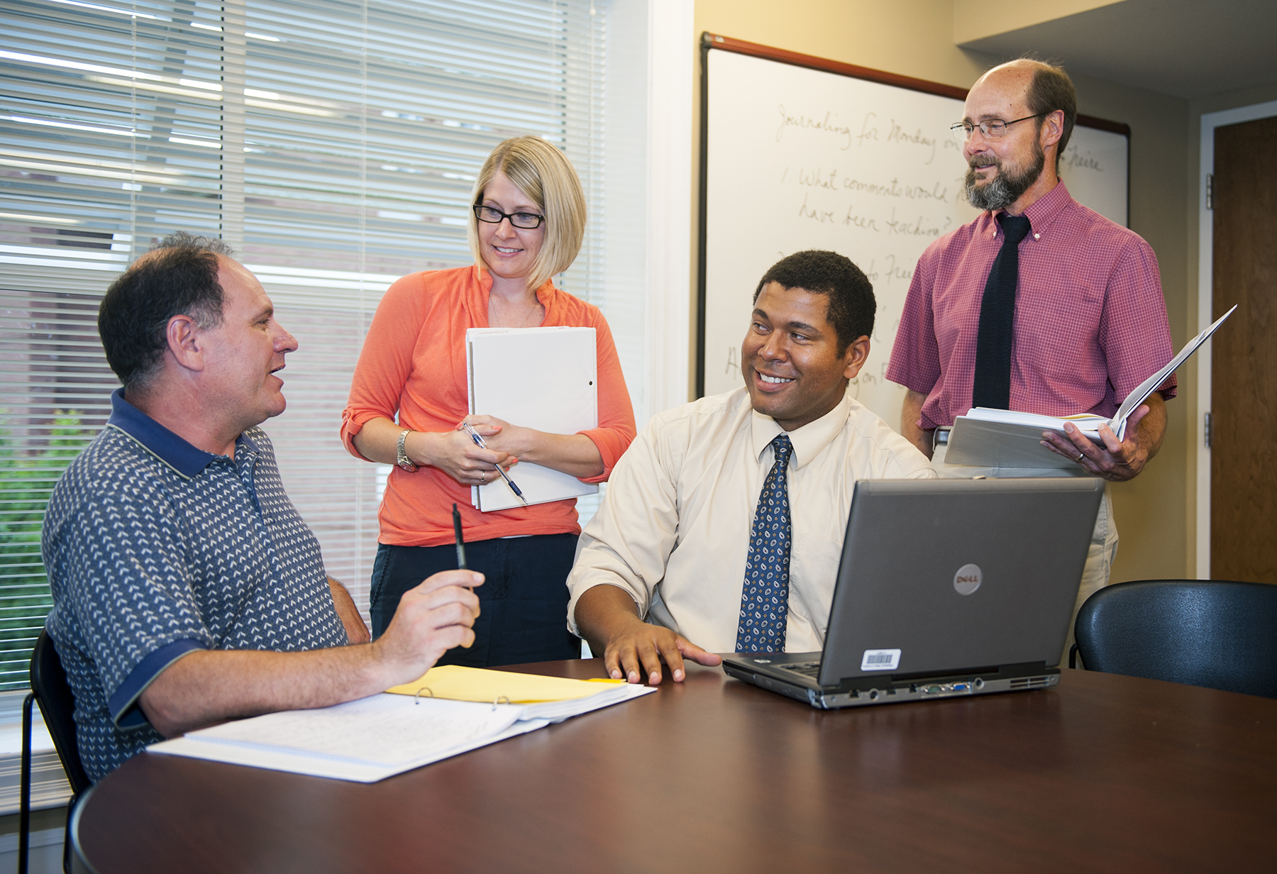 MSU just launched its first Maroon Institute for Writing Excellence, a faculty training initiative designed to enhance student learning through writing. Among the participants are (l-r) Robert Moore of marketing, Jamie Larson of animal and dairy science, Donald Shaffer of English and African-American studies, and Rich Raymond, also of English and the institute's moderator and facilitator.