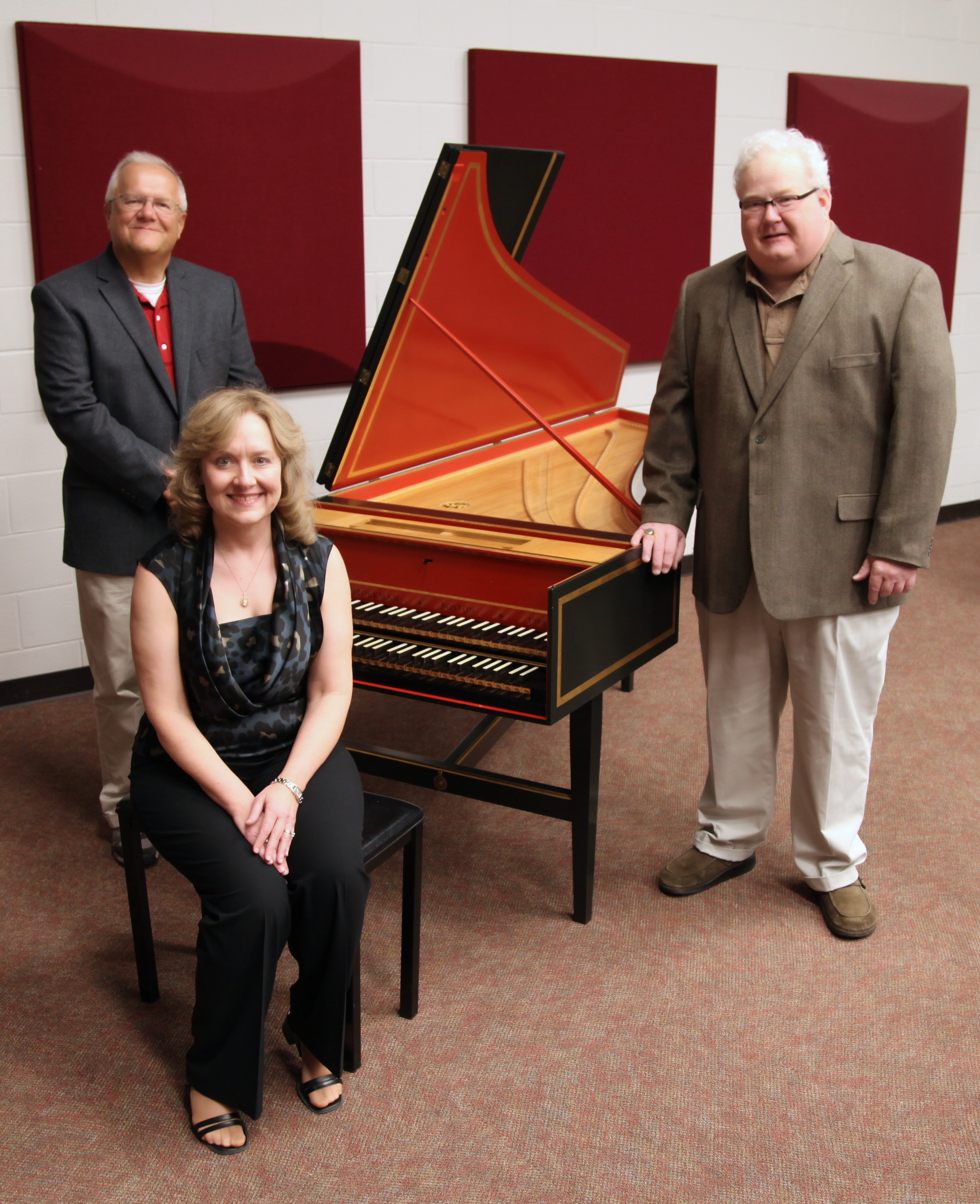 Shown with the MSU music department's new French double-manual harpsichord are, from left, Michael Brown, department head; Jackie Edwards-Henry, piano professor; and Dr. Chester Lott, Starkville physician and contributor of the instrument. Shown with the MSU music department's new French double-manual harpsichord are, from left, Michael Brown, department head; Jackie Edwards-Henry, piano professor; and Dr. Chester Lott, Starkville physician and contributor of the instrument.