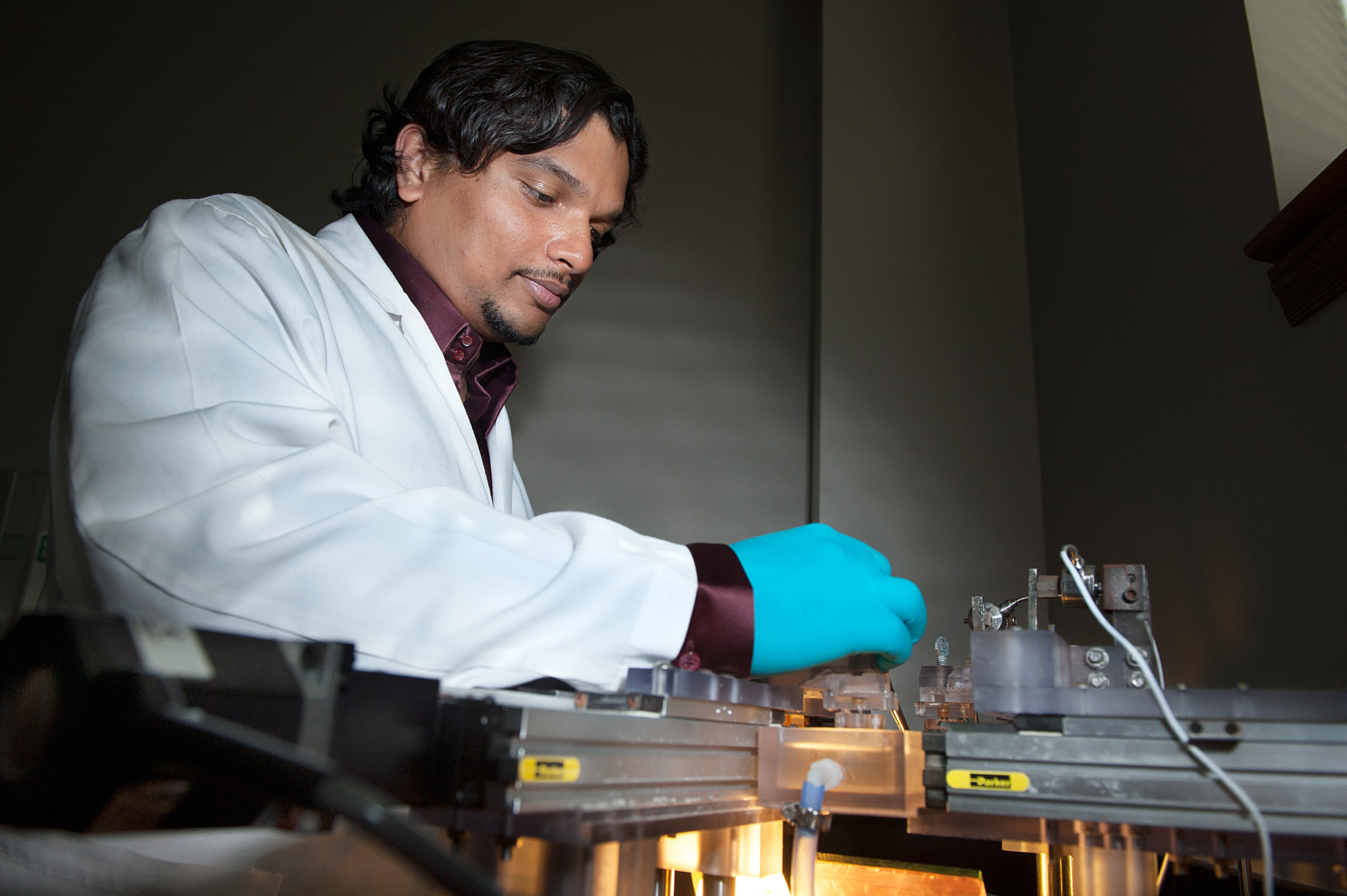 Sourav Patnaik uses the biaxial machine in the Agricultural and Bioengineering lab to stretch sheep tissue and determine its viability. He recently won the prestigious Southeastern Microscopy Society Ruska Award in recognition of his research.