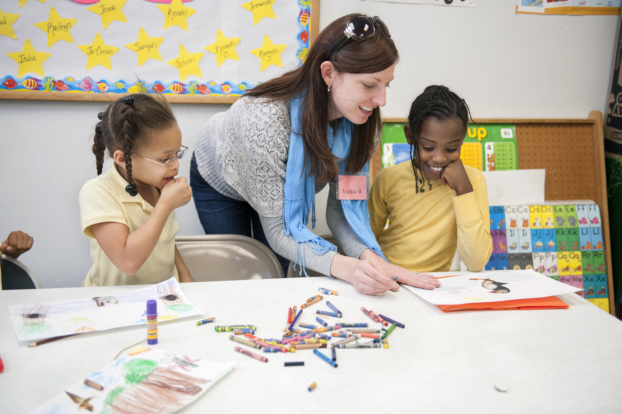 Lori Neuenfeldt, coordinator of Mississippi State University's Visual Arts Center Gallery and Outreach Programs, reinforces a lesson about animals with an arts activity. A new report by MSU's Stennis Institute of Government and Community Development finds classroom arts integration can reduce or eliminate students' educational achievement gaps.