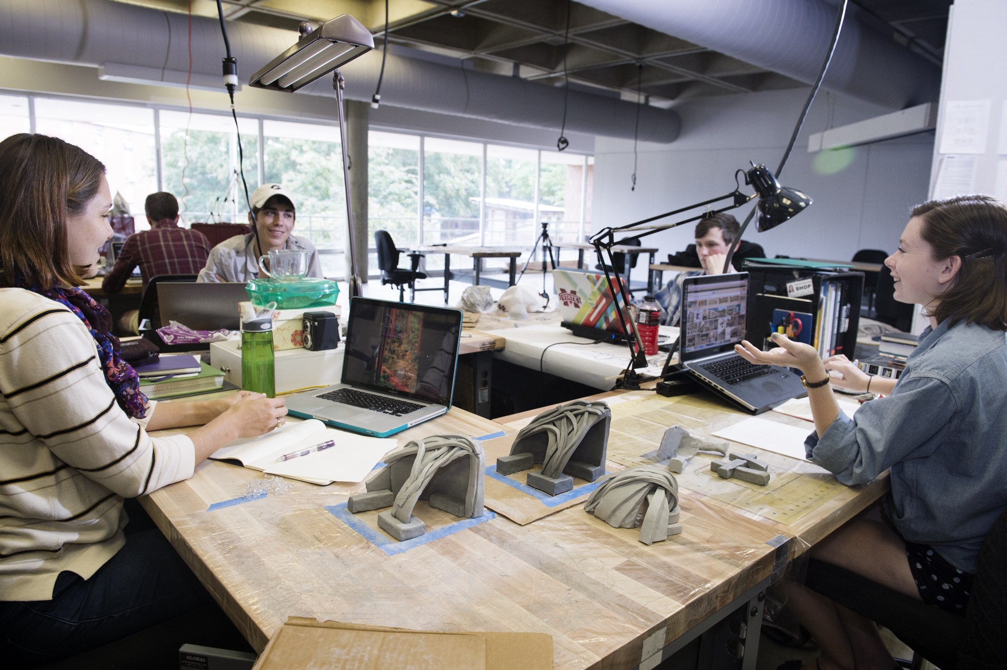 In the only course of its kind in the nation, a Mississippi State University collaborative studio includes building construction science and architecture majors. From left are sophomore architecture majors Ria Bennett and Walt Carter, both of Birmingham, Ala.; BCS major Tim Sullivan of Madison, Ala.; and architecture major Rachel Patronas, also of Madison, Ala.