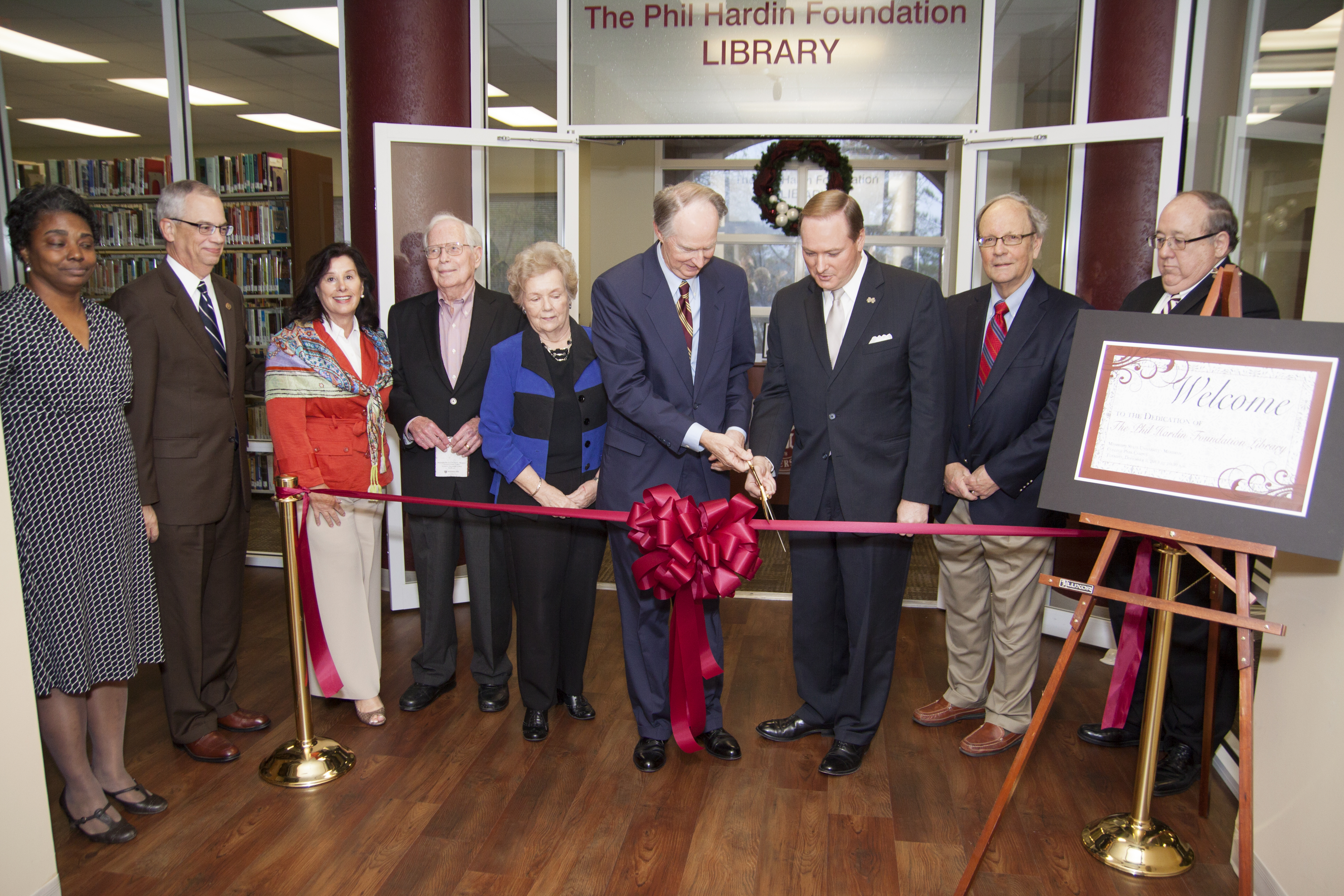 Taking part in the dedication and ribbon cutting of the Phil Hardin Foundation Library at the Mississippi State University - Meridian College Park campus on Tuesday were, left to right: Melanie Thomas, MSU-Meridian Library Services Coordinator; MSU Provost Jerry Gilbert; Hardin Foundation executive director Rebecca Combs-Dulaney; Hardin Foundation director Robert B. Deen Jr.; MSU Dean of Libraries Frances N. Coleman; Hardin Foundation Board of Directors President Robert F. Ward; MSU President Mark E. Keenum; Hardin Foundation director Stephen O. Moore; and Steven F. Brown, Dean of MSU-Meridian. Taking part in the dedication and ribbon cutting of the Phil Hardin Foundation Library at the Mississippi State University - Meridian College Park campus on Tuesday were, left to right: Melanie Thomas, MSU-Meridian Library Services Coordinator; MSU Provost Jerry Gilbert; Hardin Foundation executive director Rebecca Combs-Dulaney; Hardin Foundation director Robert B. Deen Jr.; MSU Dean of Libraries Frances N. Coleman; Hardin Foundation Board of Directors President Robert F. Ward; MSU President Mark E. Keenum; Hardin Foundation director Stephen O. Moore; and Steven F. Brown, Dean of MSU-Meridian.