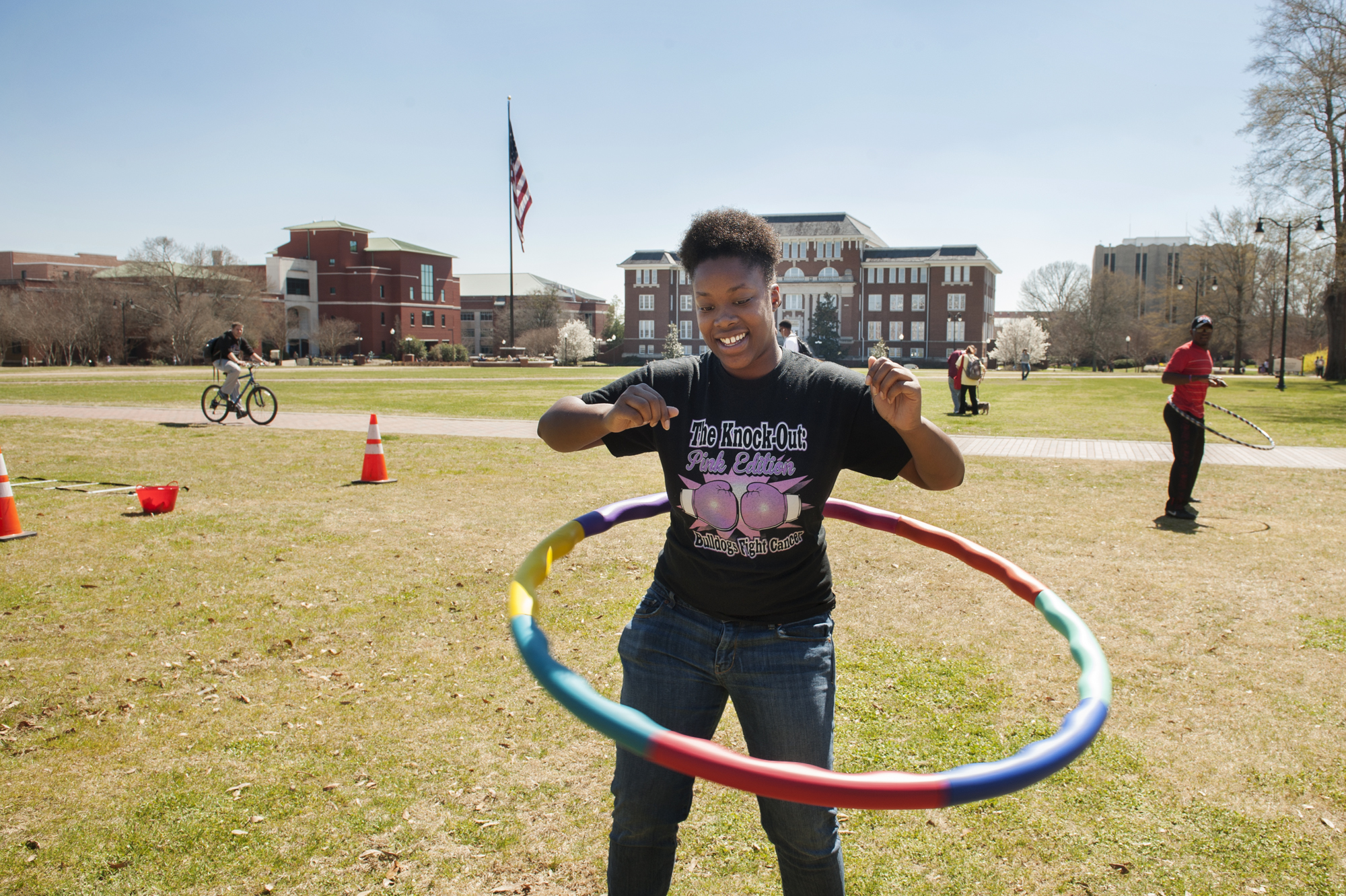 Chelsi Hosey, a freshman business major from Heidelberg, set the day's hula hooping record at the recent March into Spring event sponsored by health education and wellness.