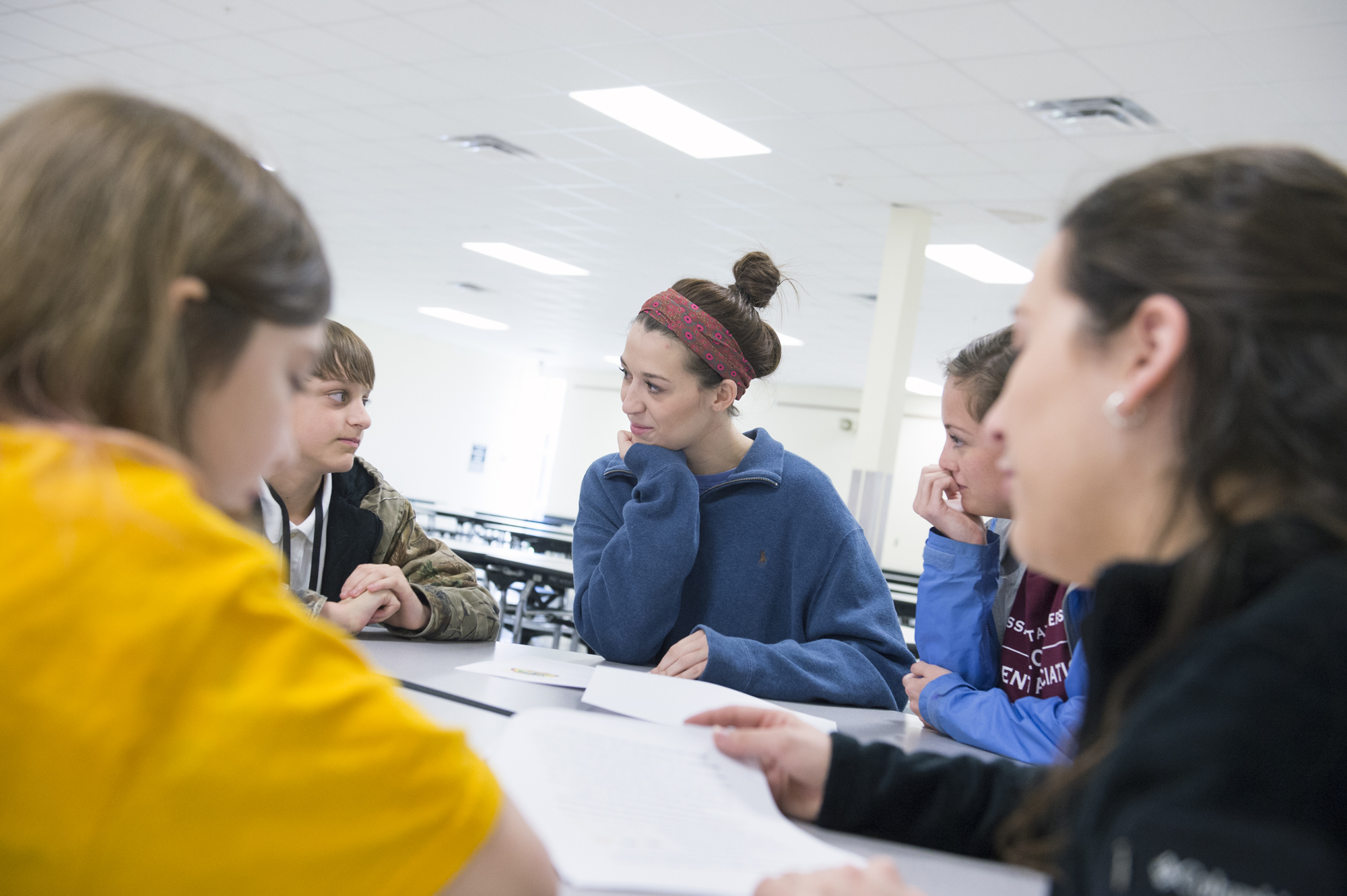 Mississippi State University senior Elizabeth A. Anderson, center, listens to an Armstrong Middles School student's feedback about how kindness can stop bullying. Future middle school teachers recently joined sixth-graders to plan seeds of kindness, part of the A-OK anti-bullying initiative. Mississippi State University senior Elizabeth A. Anderson, center, listens to an Armstrong Middles School student's feedback about how kindness can stop bullying. Future middle school teachers recently joined sixth-graders to plan seeds of kindness, part of the A-OK anti-bullying initiative.