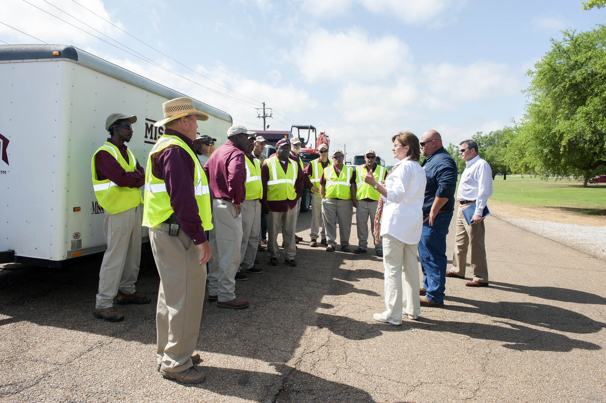 Mississippi State University Campus Operations and Extension Service personnel departed today [April 29] for the town of Louisville in neighboring Winston County to assist in clean-up efforts after tornadoes ravaged the area on Monday. Here, MSU Vice President for Campus Services Amy Tuck gives some final instructions to crew members and staff who are equipped with generators, chain saws and other maintenance supplies to aid in recovery.