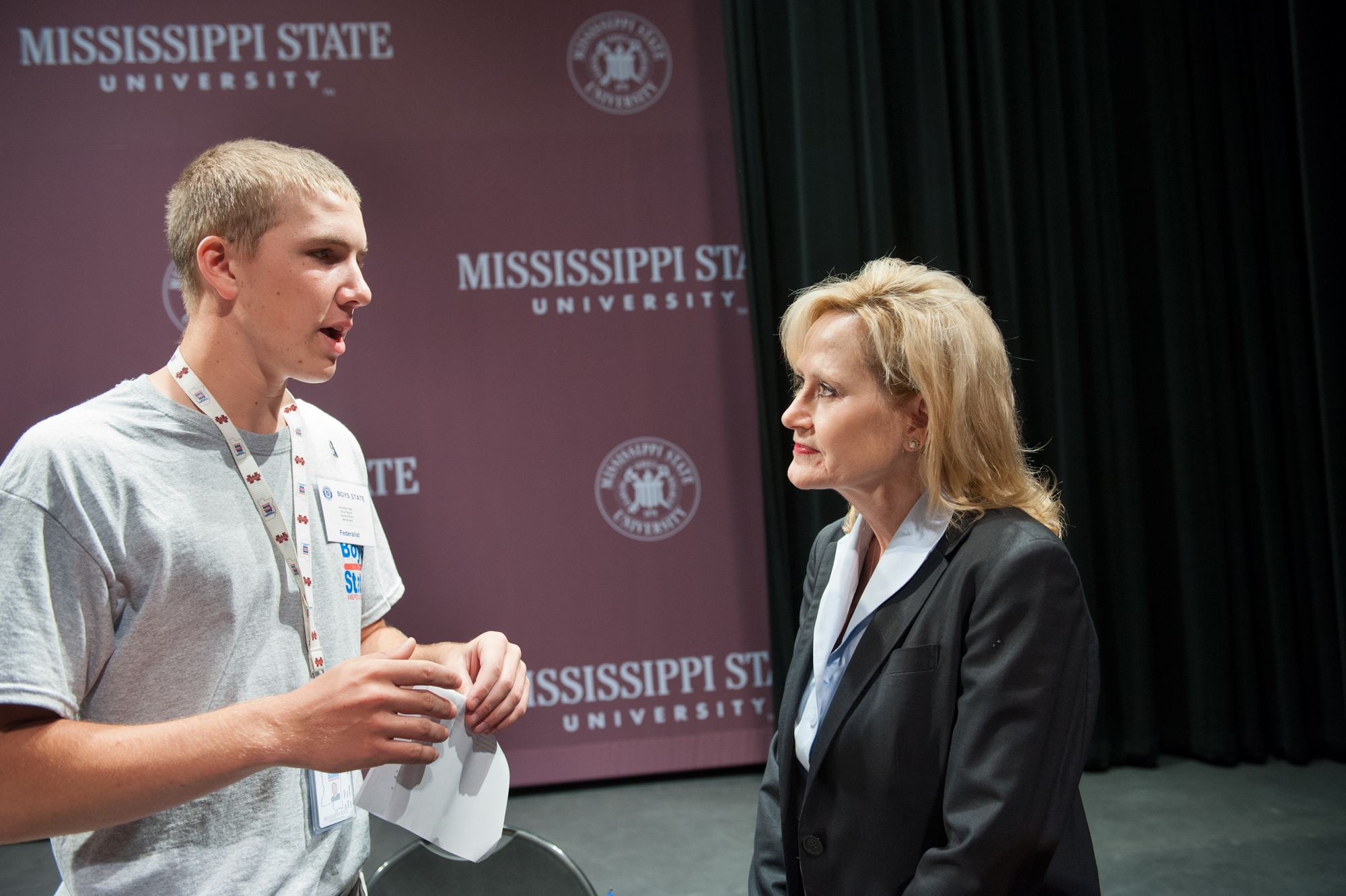 Boys State Commissioner for Agriculture Johnathon Gage of Picayune visits with Mississippi Commissioner for Agriculture and Commerce Cindy Hyde-Smith following her remarks at Mississippi State University on May 29. 