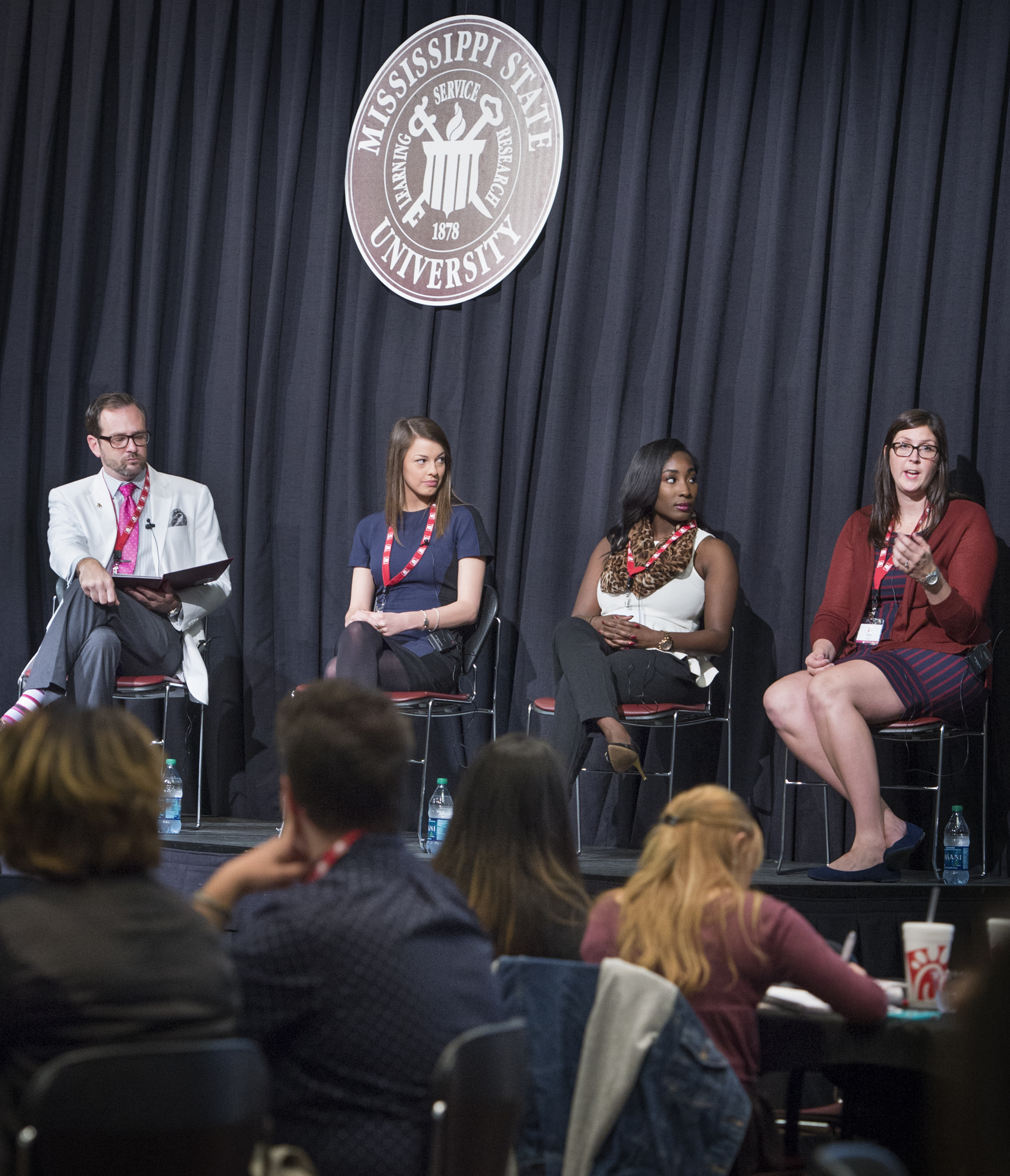 MSU alumni Caroline Gilbert, right, tells Mississippi State University fashion design and merchandising students how important mentors are at the Leadership Retail Program Conference on Thursday. Charles Freeman, MSU assistant professor, moderated the panel, which also included Caroline Gilbert, assistant customer experience manager at Nordstrom and Shaquayla Mims, coordinator of student initiative for National Retail Federation. 