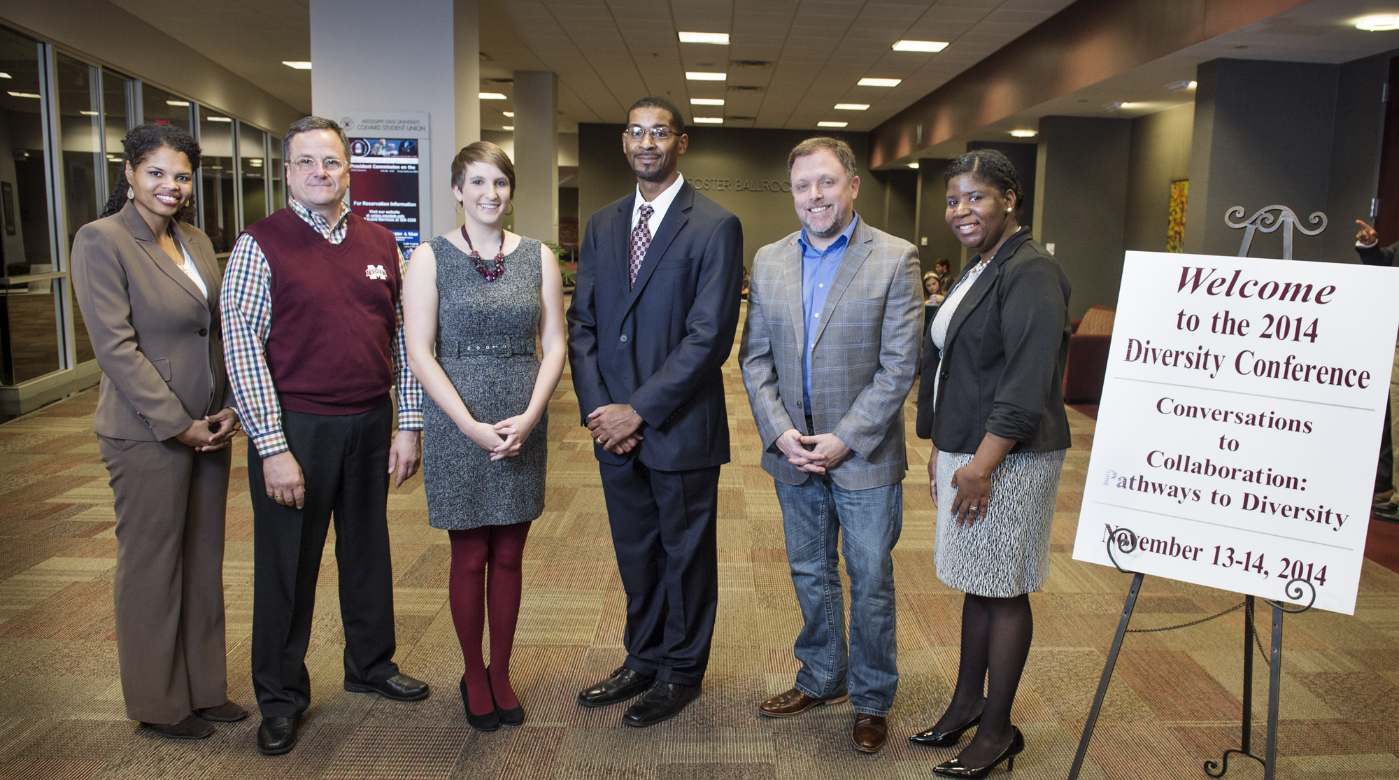 Mississippi State University's 2014 Diversity Conference featured a range of speakers, including keynote presenter Tim Wise, fifth from left. Supporters for "Conversation to Collaboration: Pathways to Diversity" included, from left, agricultural and biological engineering associate professor Lakiesha Williams, plant and soil sciences professor James DelPrince, counselor education graduate student Amanda Alberti, President's Commission of the Status of Minorities Chair Gregory Hunley, keynote-speaker Wise and Holmes Cultural Diversity Center Associate Director Ra'Sheda Boddie-Forbes.