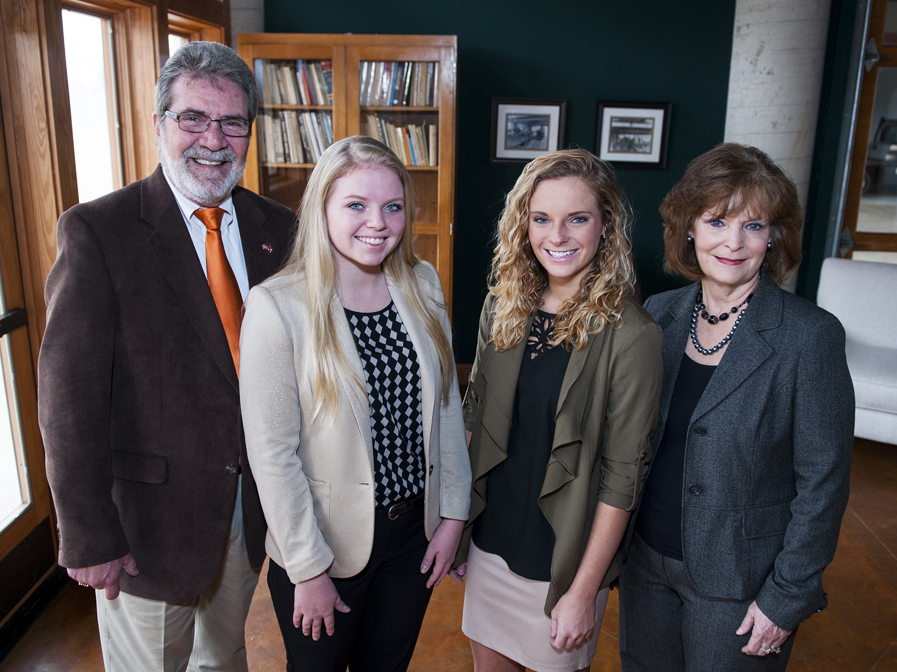 American Home Furnishings Alliance is awarding scholarships to two interior design majors studying at Mississippi State University. Junior Daniella R. Bower, center left, and sophomore Haley Austin, center right, will each receive $16,750. Congratulating them are directors Bill Martin, MSU Franklin Furniture Institute, and Beth Miller, MSU interior design.