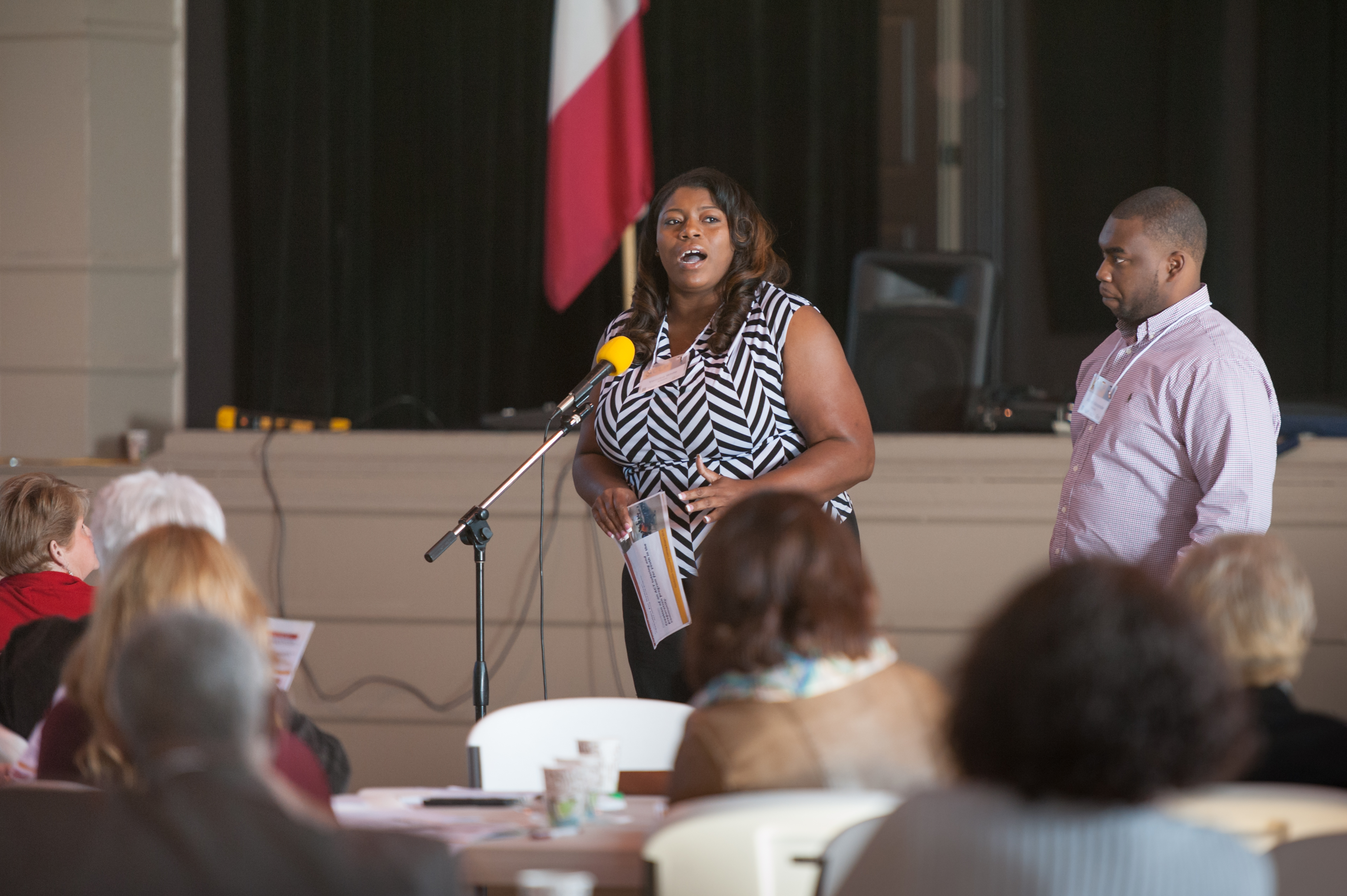 Vemitra White and Jamel Alexander from Artesia present the impacts of their "Dollars for Scholars" project at the Appalachian Community Learning Project Results and Learning Celebration event in Amory, organized by representatives of Mississippi State's John C. Stennis Institute of Government and Community Development. As a result of their project they increased the ACT scores of local students in an effort to improve the college-attendance rate of their community.