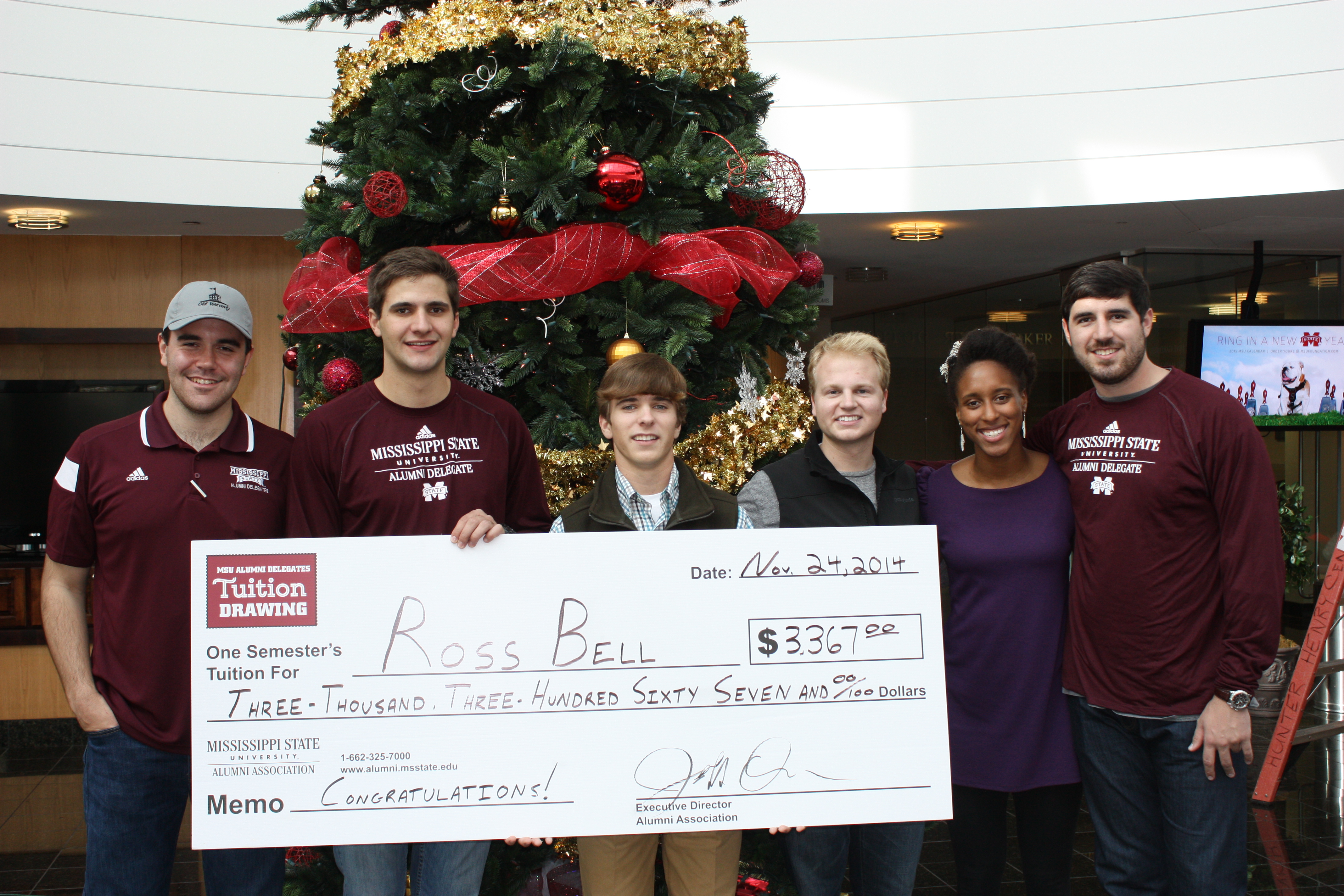 Tuition raffle winner Ross Bell of Madison, third from left, is pictured with Alumni Delegates officers, from left, Grant Krag, vice president for education; Jonathan Lancaster, raffle committee representative; Bell; Hagan Walker, raffle committee representative; Amari Kimble, secretary; and Charlie Stocks, president.  
