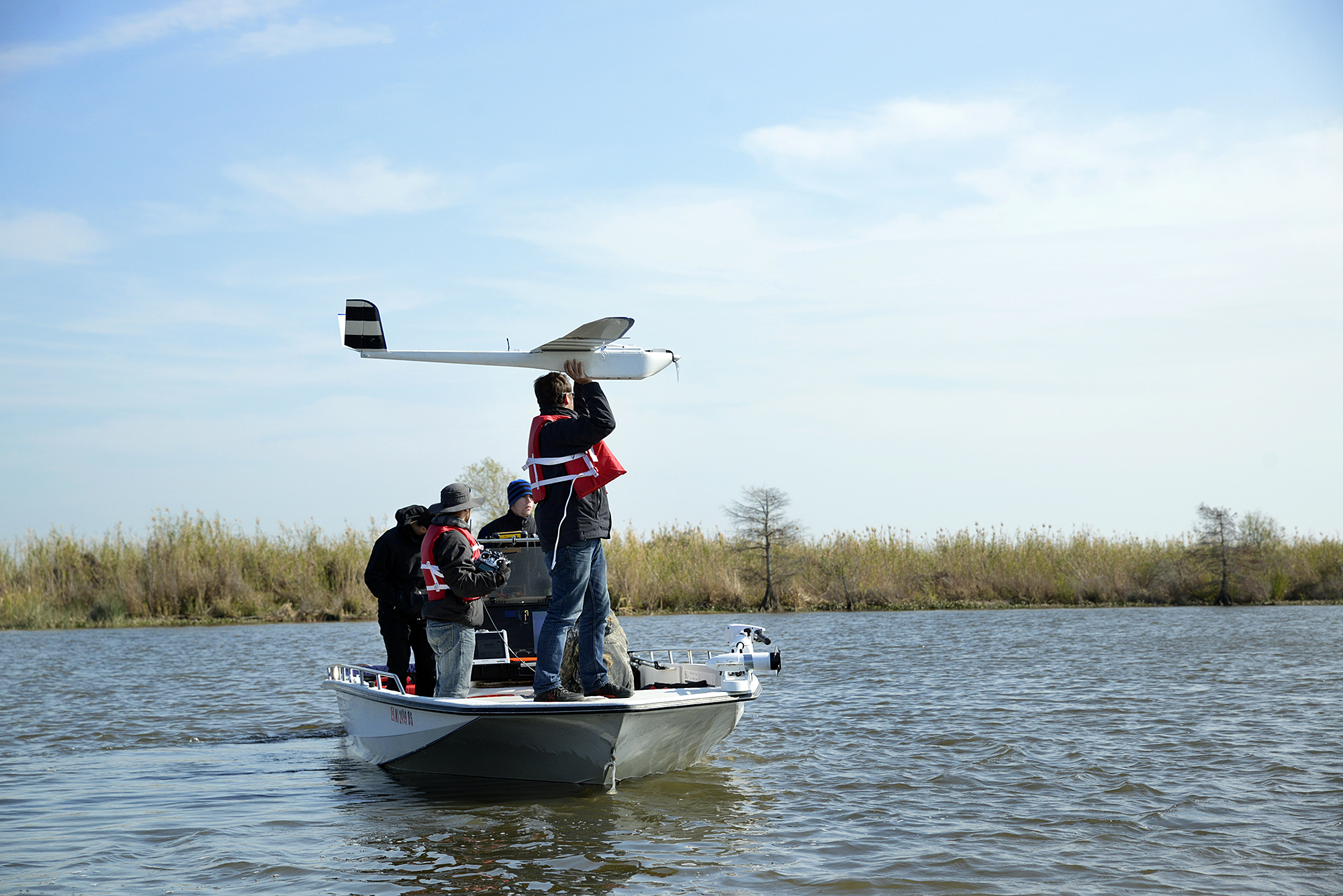 An unmanned aerial vehicle is prepared for launch on Thursday [Dec. 18] in St. Tammany Parish, Louisiana. Researchers with Mississippi State and NOAA are mapping sections of the Pearl River with the UAV to better understand where and how much water flows through the area and the impact it can have on local communities when hurricanes and other tropical weather systems develop. 