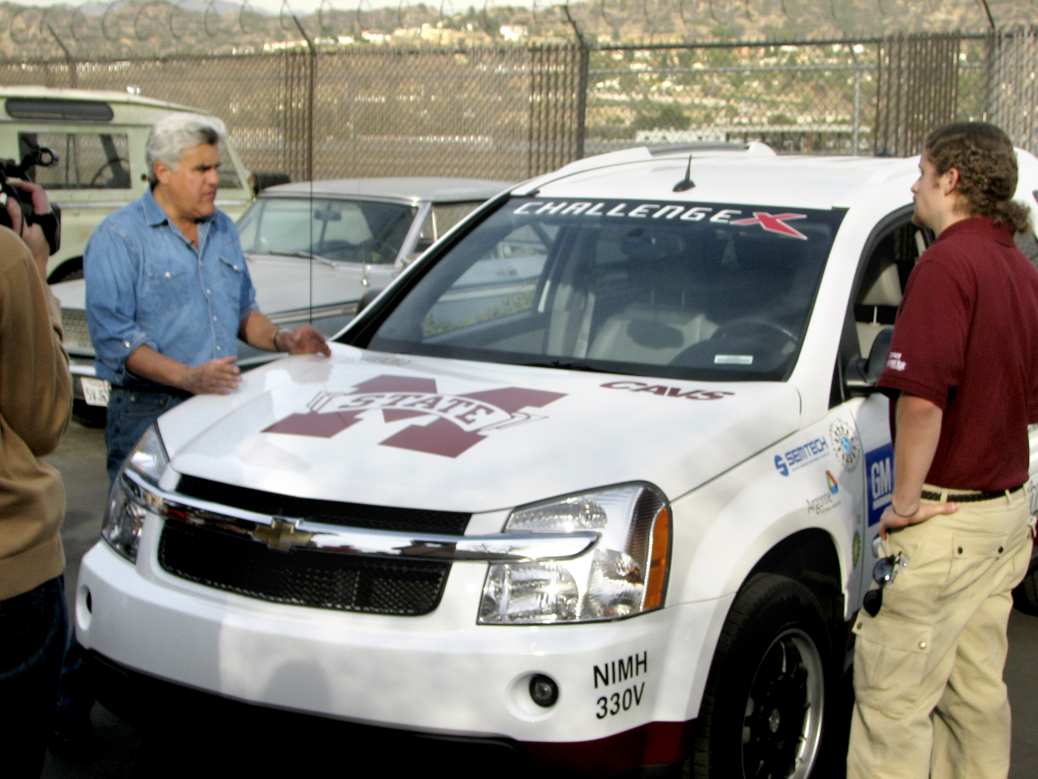 Comedian Jay Leno (l) and MSU student Stephen Phillips discuss the winning Challenge X vehicle. Phillips is an electrical engineering graduate student from French Camp. Comedian Jay Leno (l) and MSU student Stephen Phillips discuss the winning Challenge X vehicle. Phillips is an electrical engineering graduate student from French Camp.
