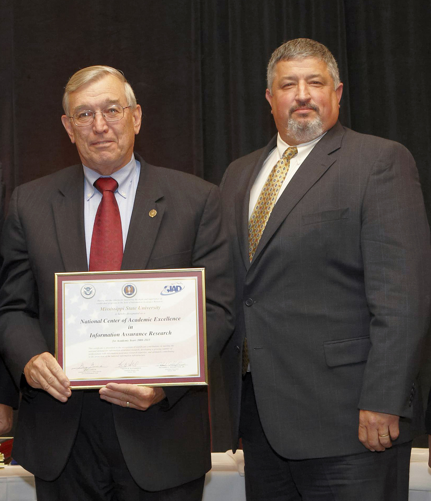 Ray Vaughn (l) and David Dampier display MSU's newest NSA certification. Ray Vaughn (l) and David Dampier display MSU's newest NSA certification.